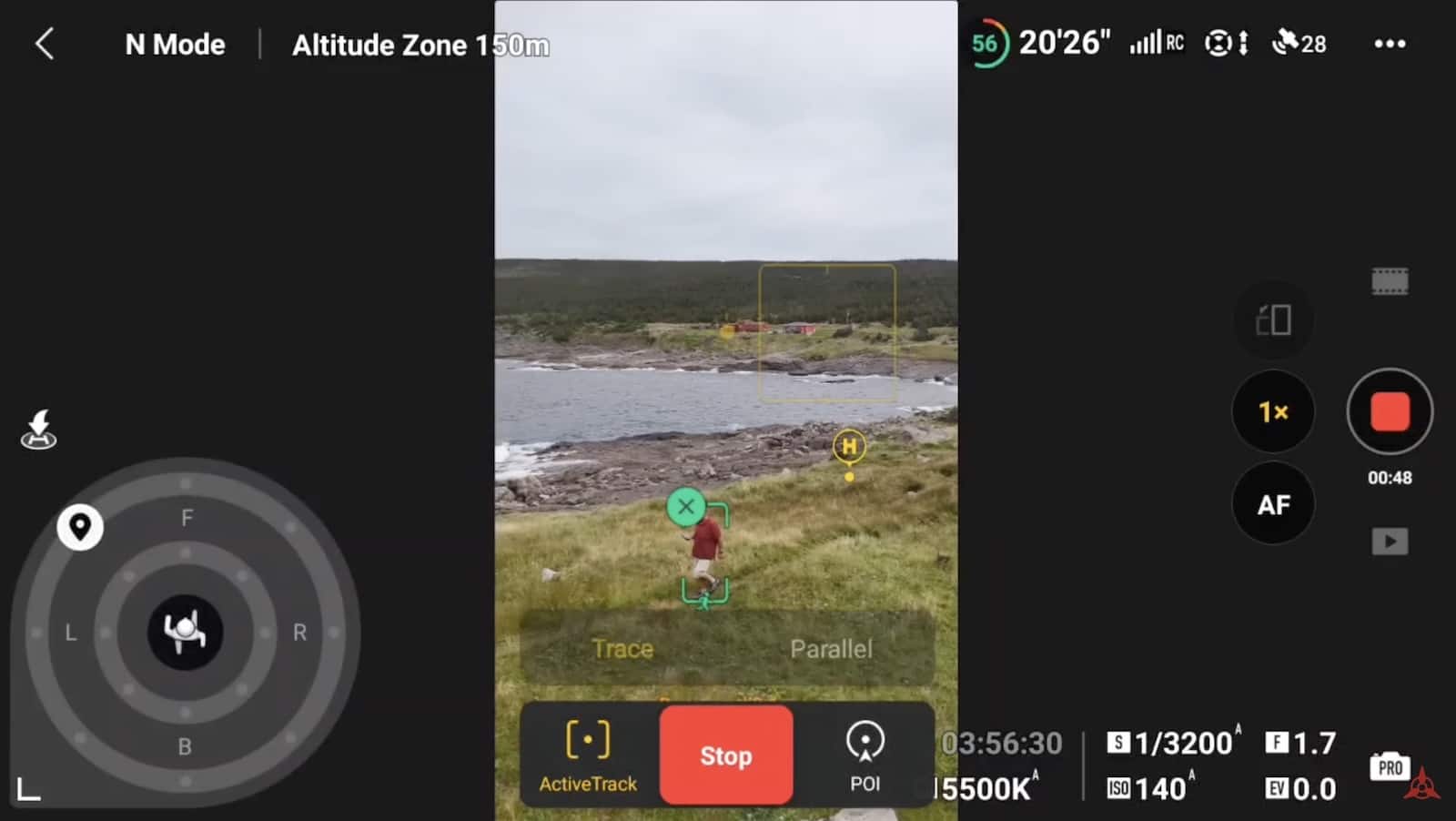 The DJI Fly screen offering Trace and Parallel tracking over a rocky coastline.