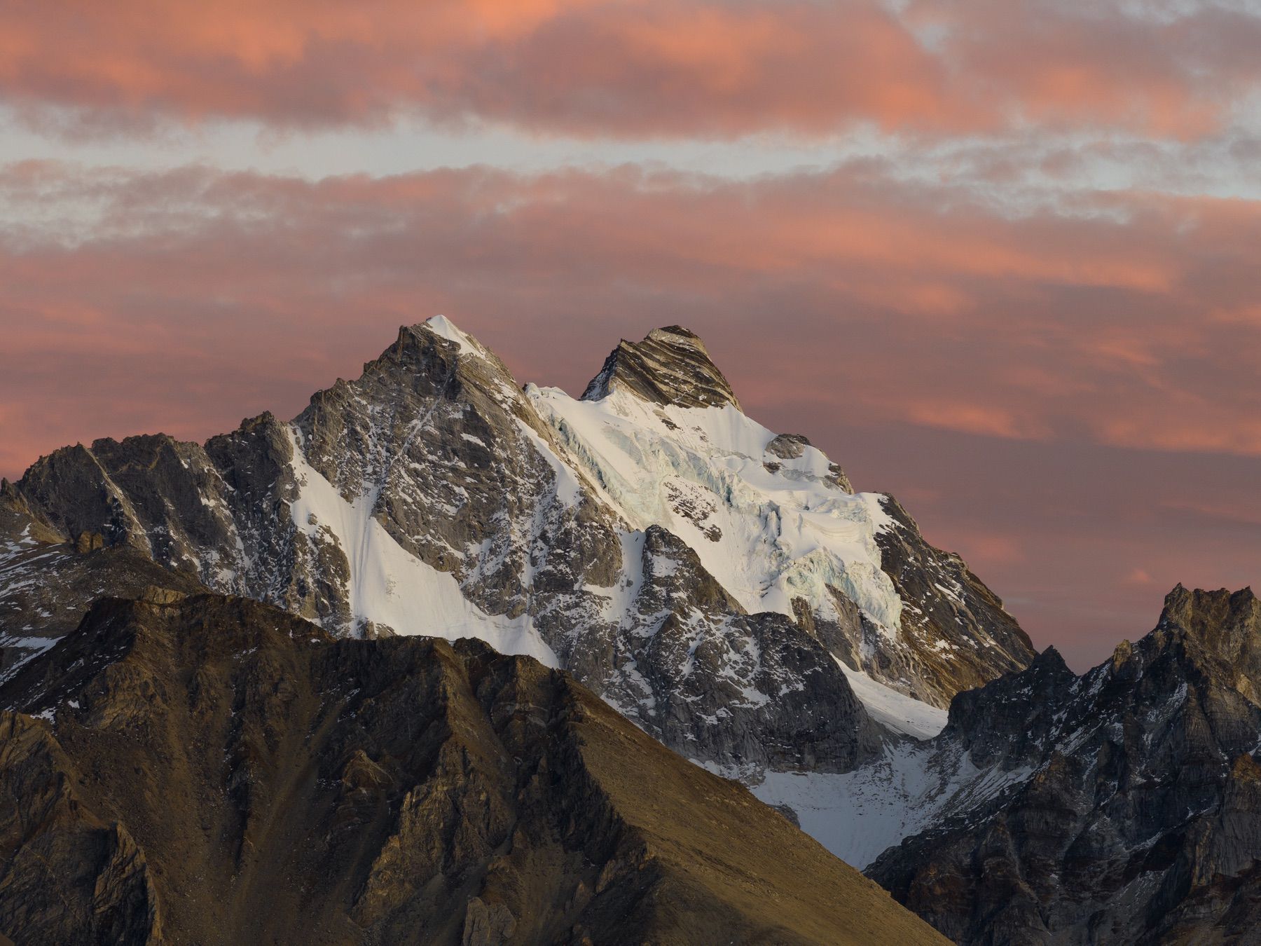 A 168mm crop isolating the jagged glaciated summit.