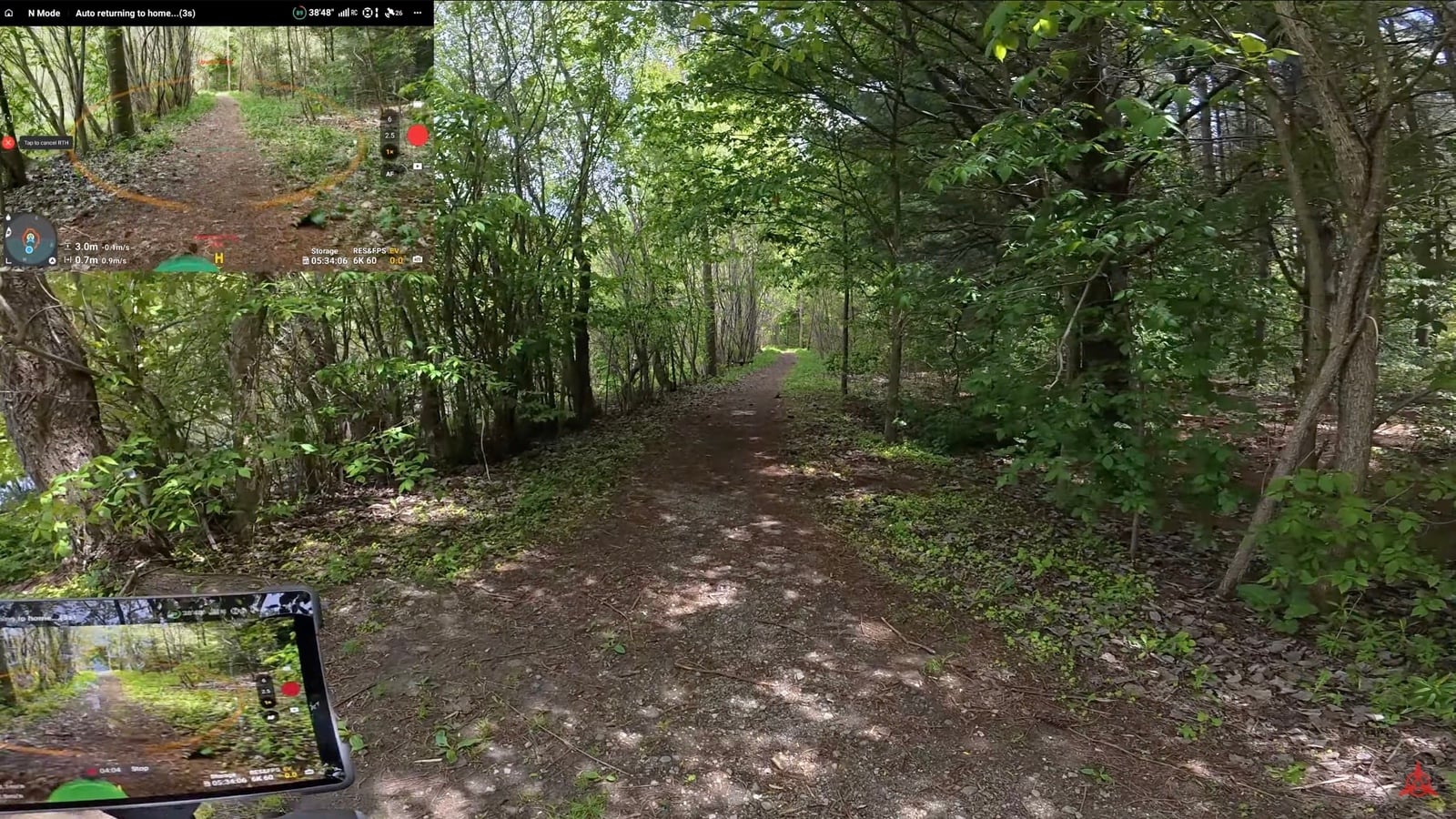 A woodland trail with the controller screen inset showing the plotted return route.