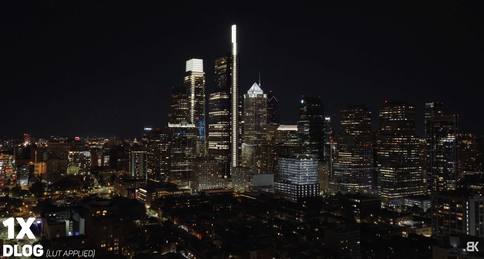 Night skyline footage labeled 1X D-Log with a viewing LUT applied.