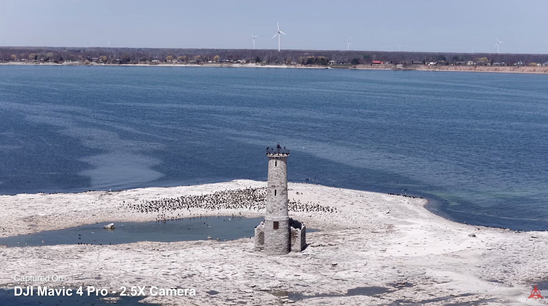 The same lighthouse pulled closer by the 70mm telephoto at 2.5x.