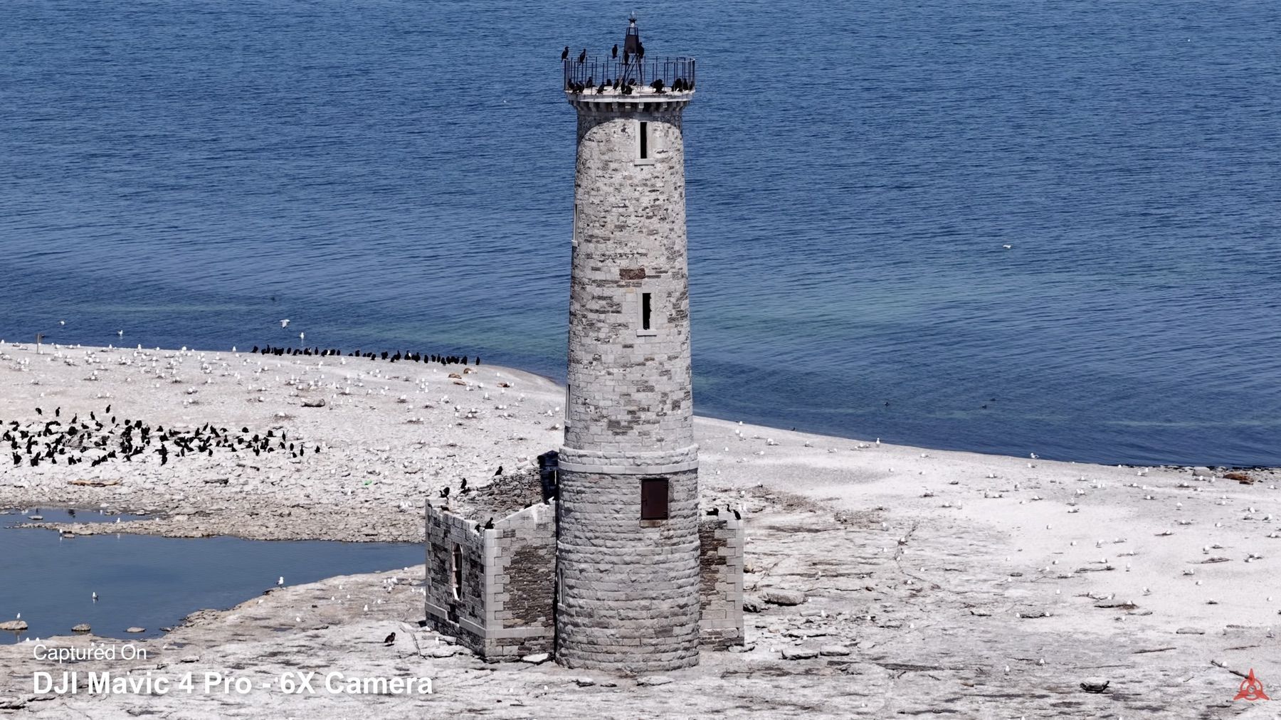 The 168mm telephoto at 6x fills the frame with the lighthouse tower.