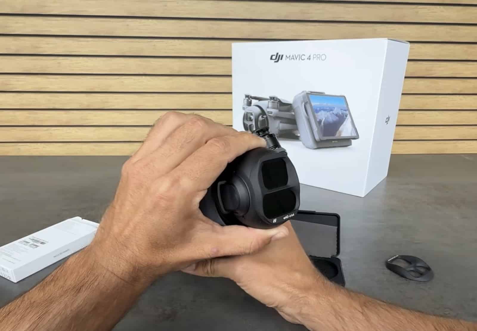 The filter clipped onto the camera assembly held above a workshop desk.