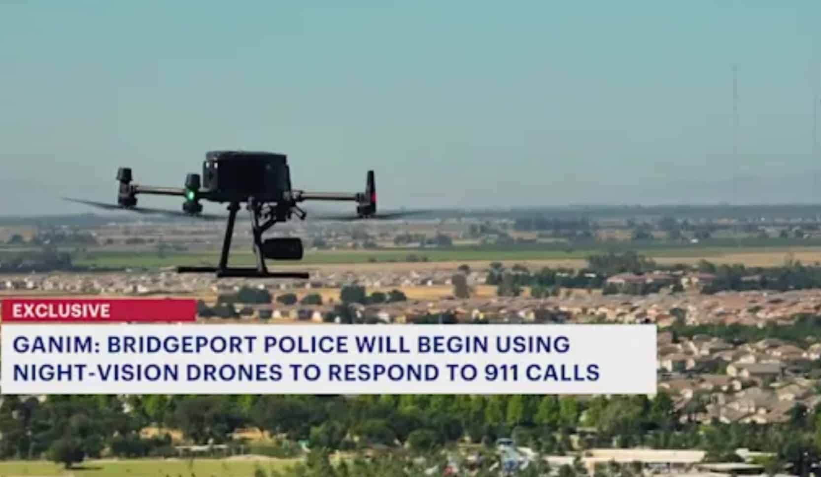 News broadcast frame of a quadcopter over Bridgeport rooftops under an exclusive banner.