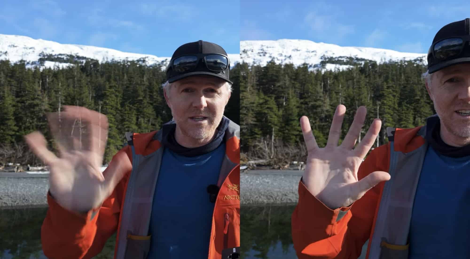Split frame of a man in an orange jacket waving, blurred hand beside a frozen one.