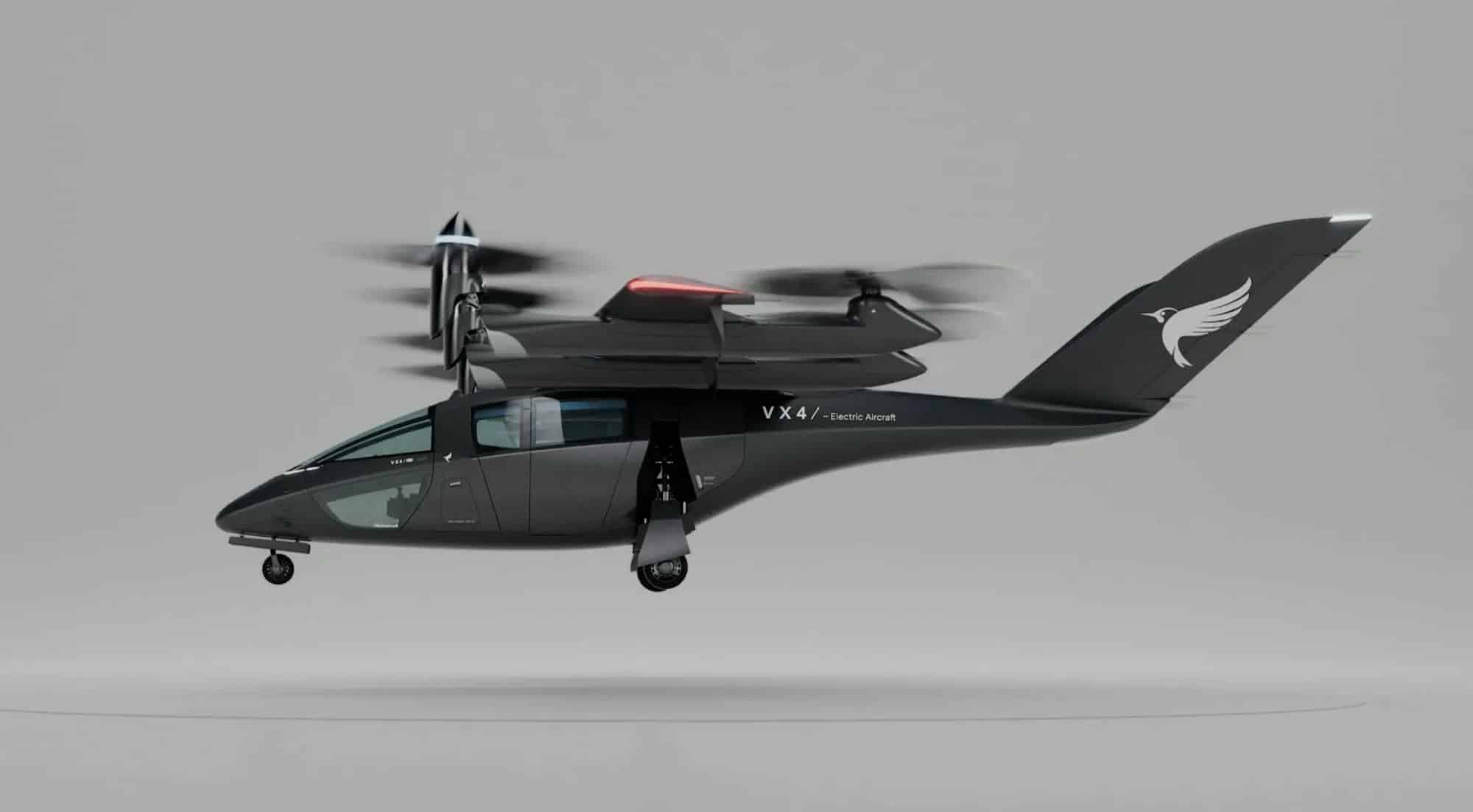 A rendered VX4 air taxi hovers with its tilt rotors spinning against grey.