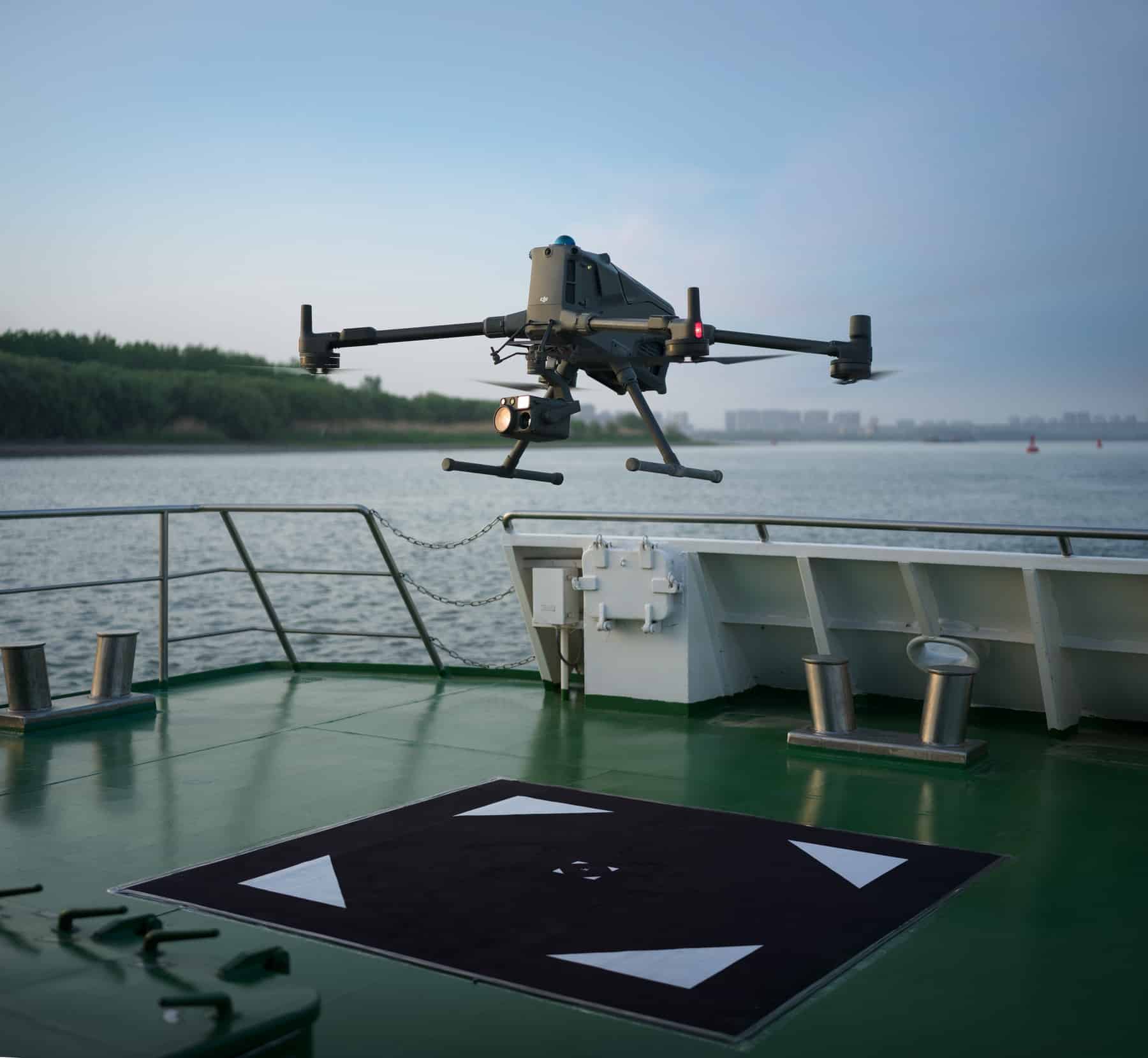 DJI Matrice 400 with its folding arms and multiple payload mounts.