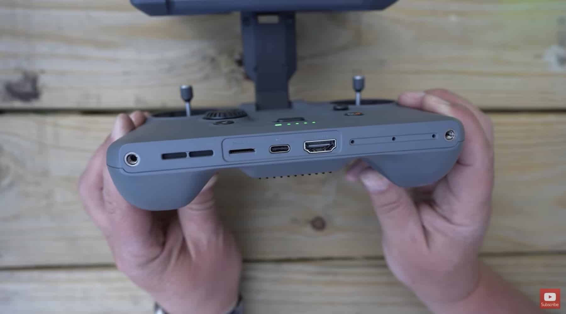 The controller flipped to show its HDMI, USB-C and memory card ports.