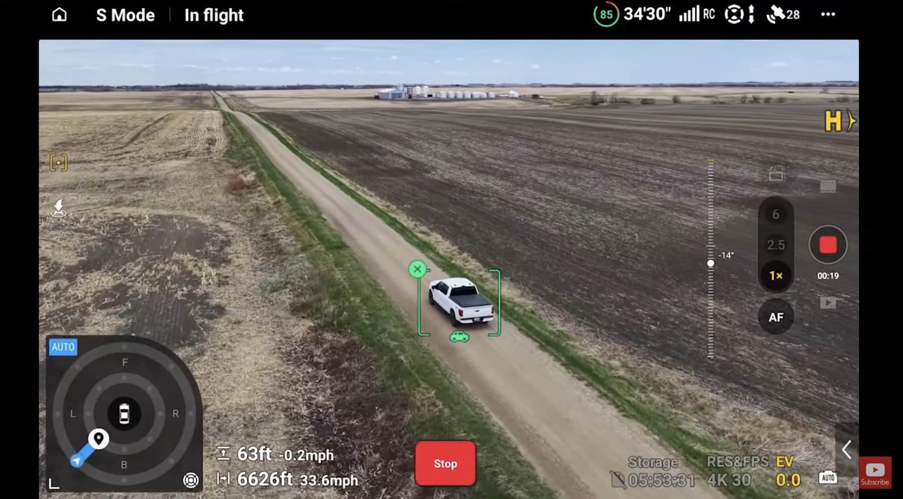 ActiveTrack follows a white pickup down a dirt road at 63 feet (19 meters).