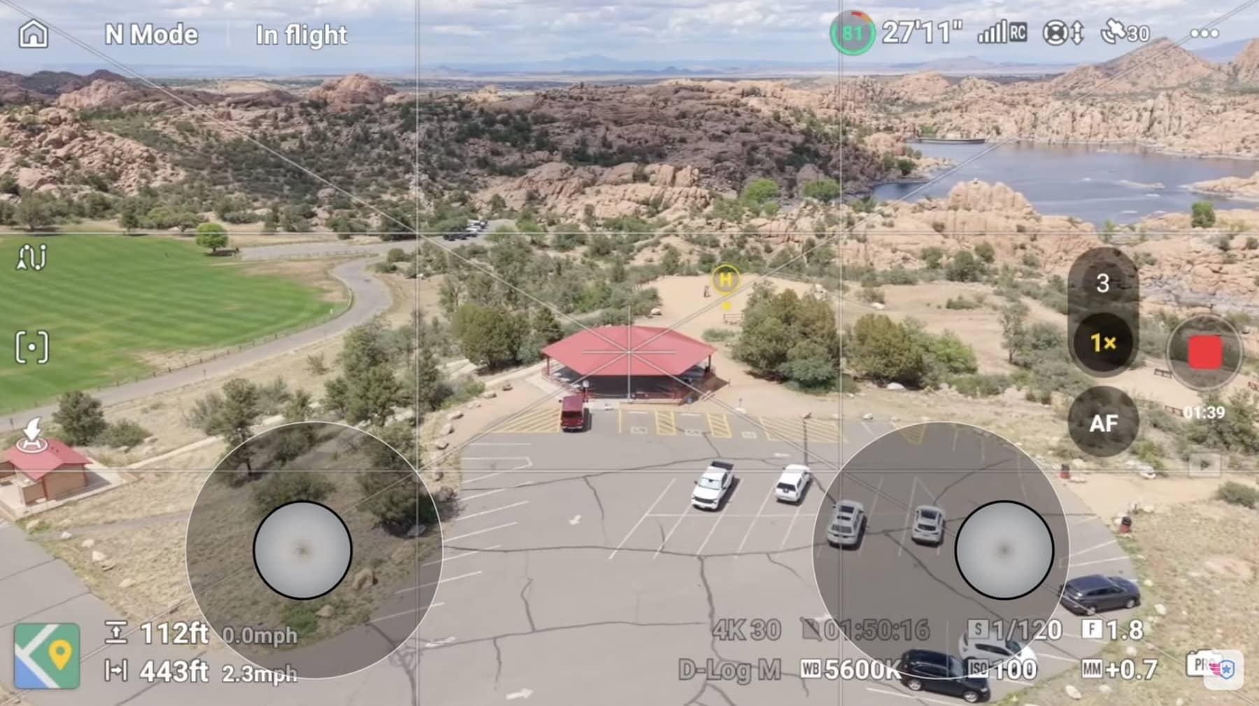 Manual orbit around a red gazebo flown with coordinated stick inputs.