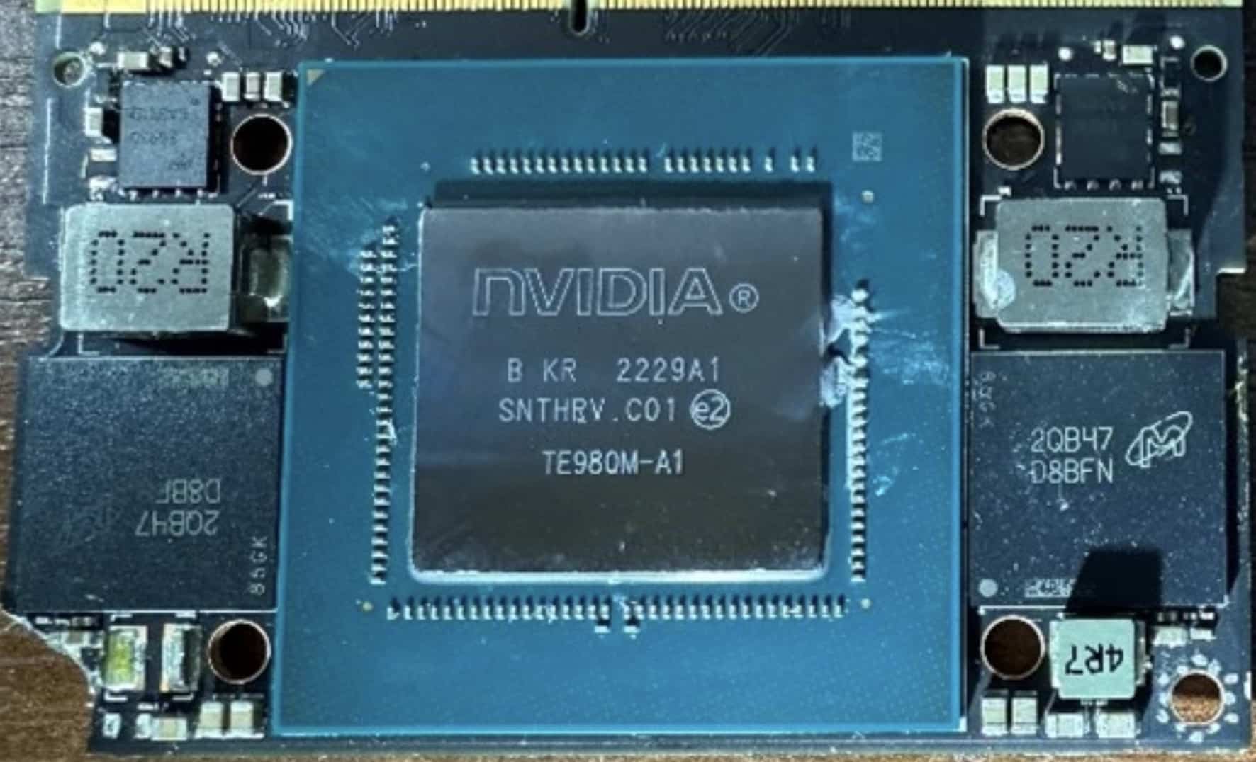Close-up of an NVIDIA processor soldered onto a recovered drone circuit board.