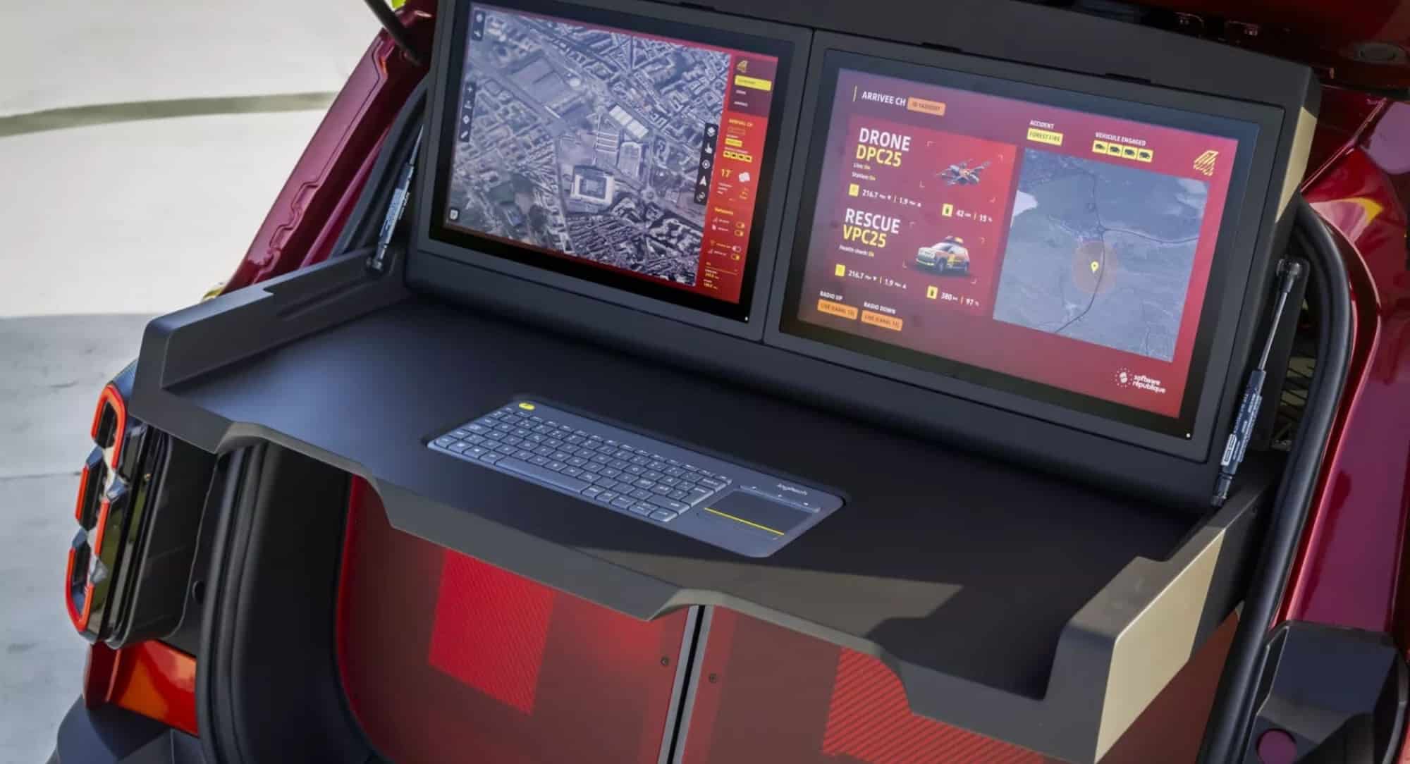 A fold-out command desk in the tailgate with mapping screens and a keyboard.