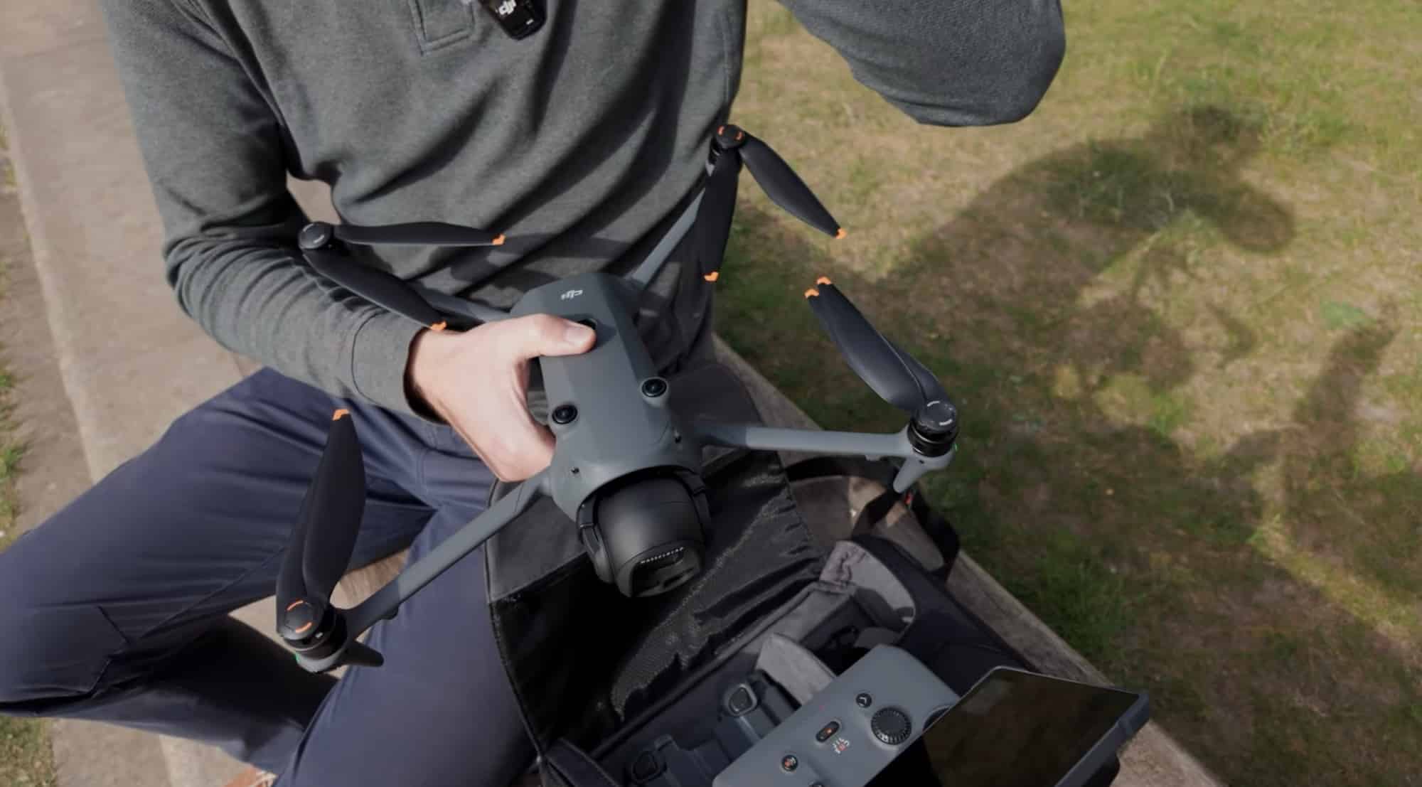 Unfolding the Mavic 4 Pro's rear leg, which powers the drone on automatically.