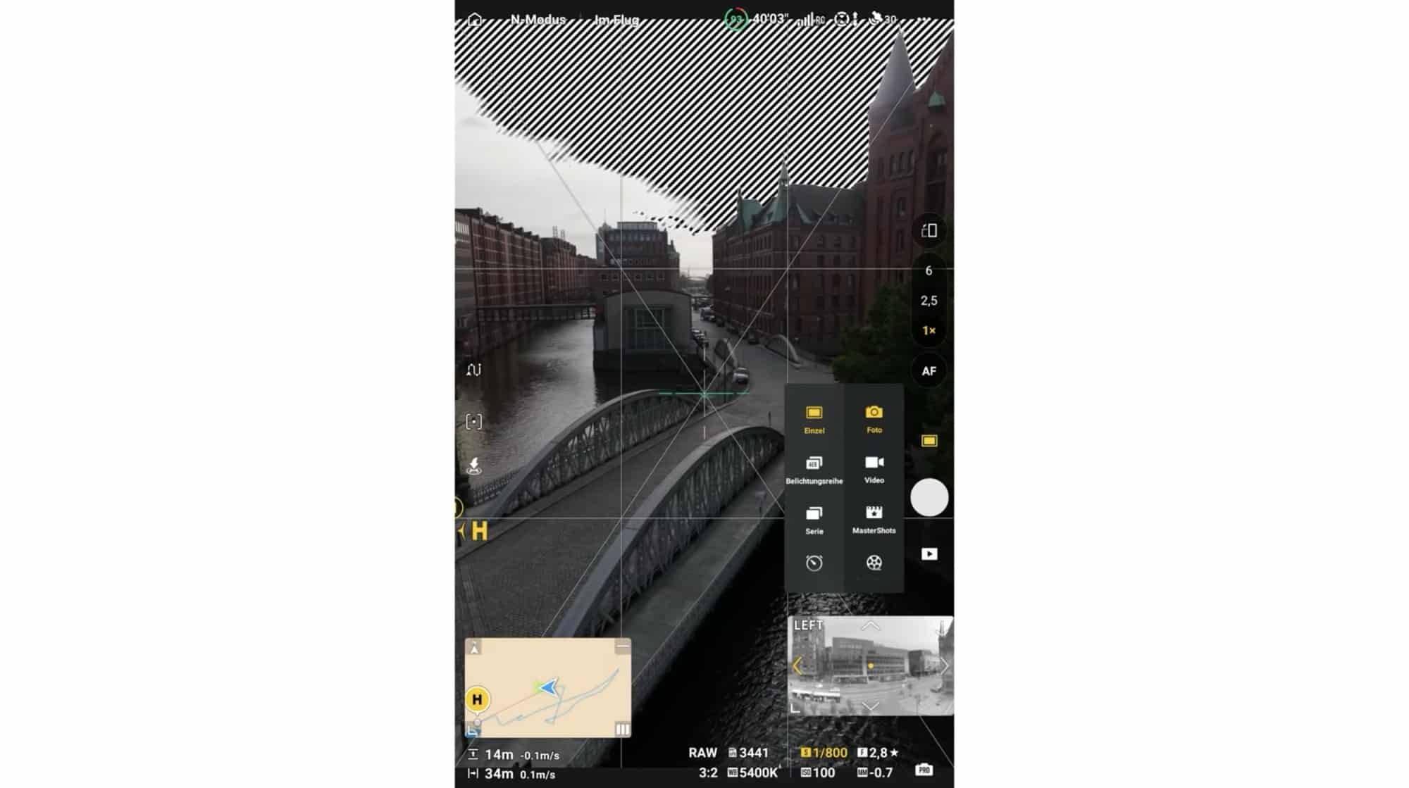 Portrait-mode flight screen framing an arched canal bridge with the settings panel open.