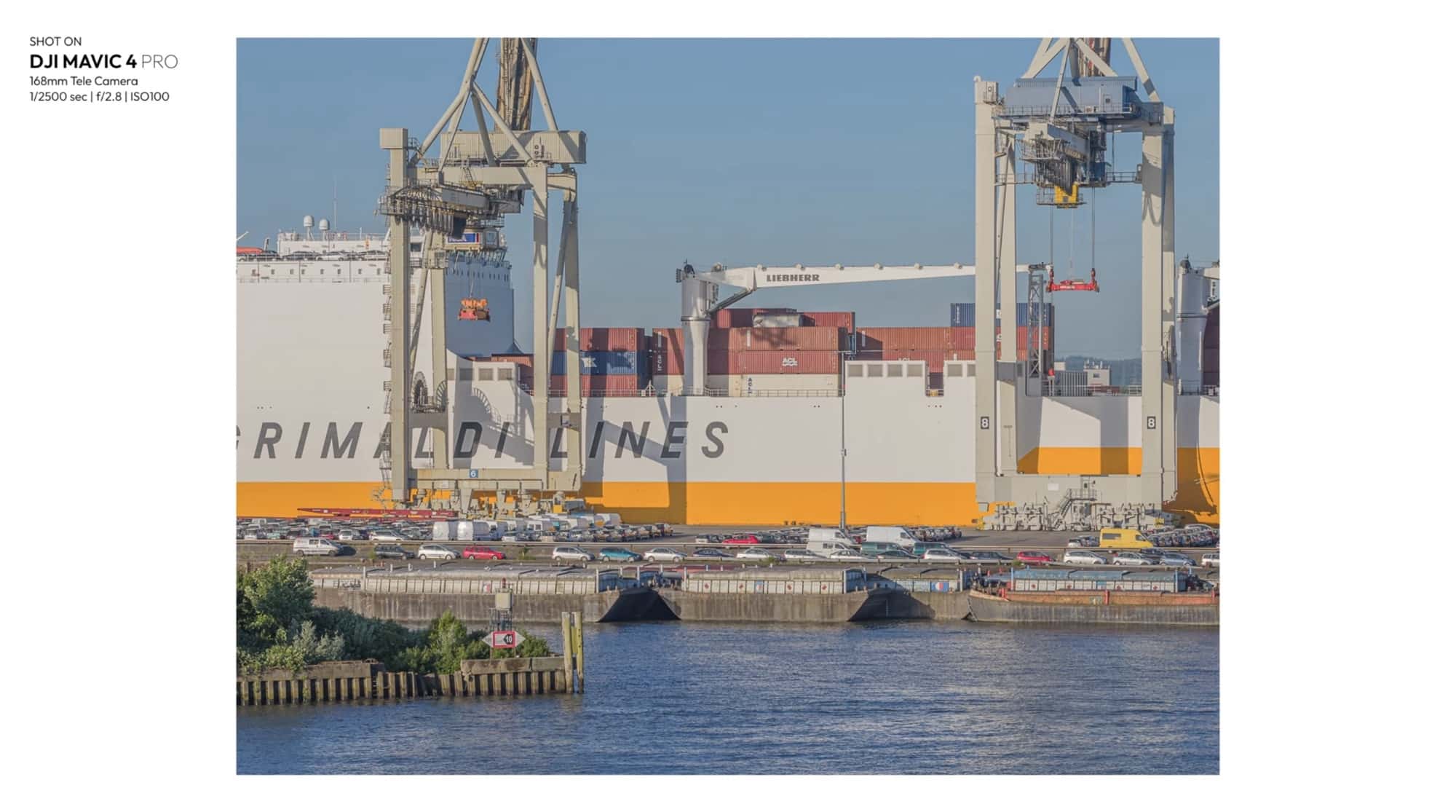 Grimaldi Lines car carrier berthed under harbor cranes, shot at 1/2500 and ISO 100.