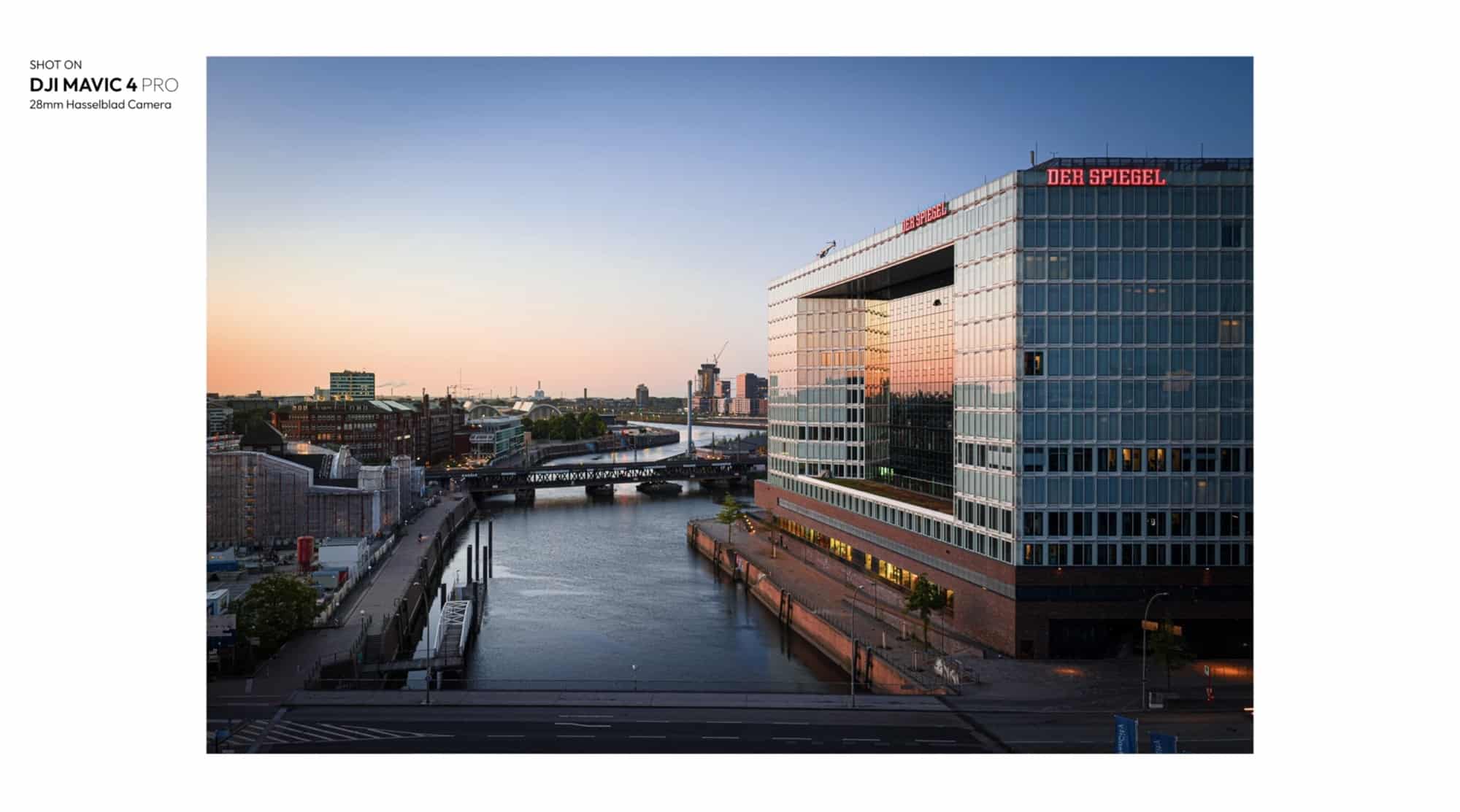 Der Spiegel headquarters beside a canal at sunrise from the 28mm camera.