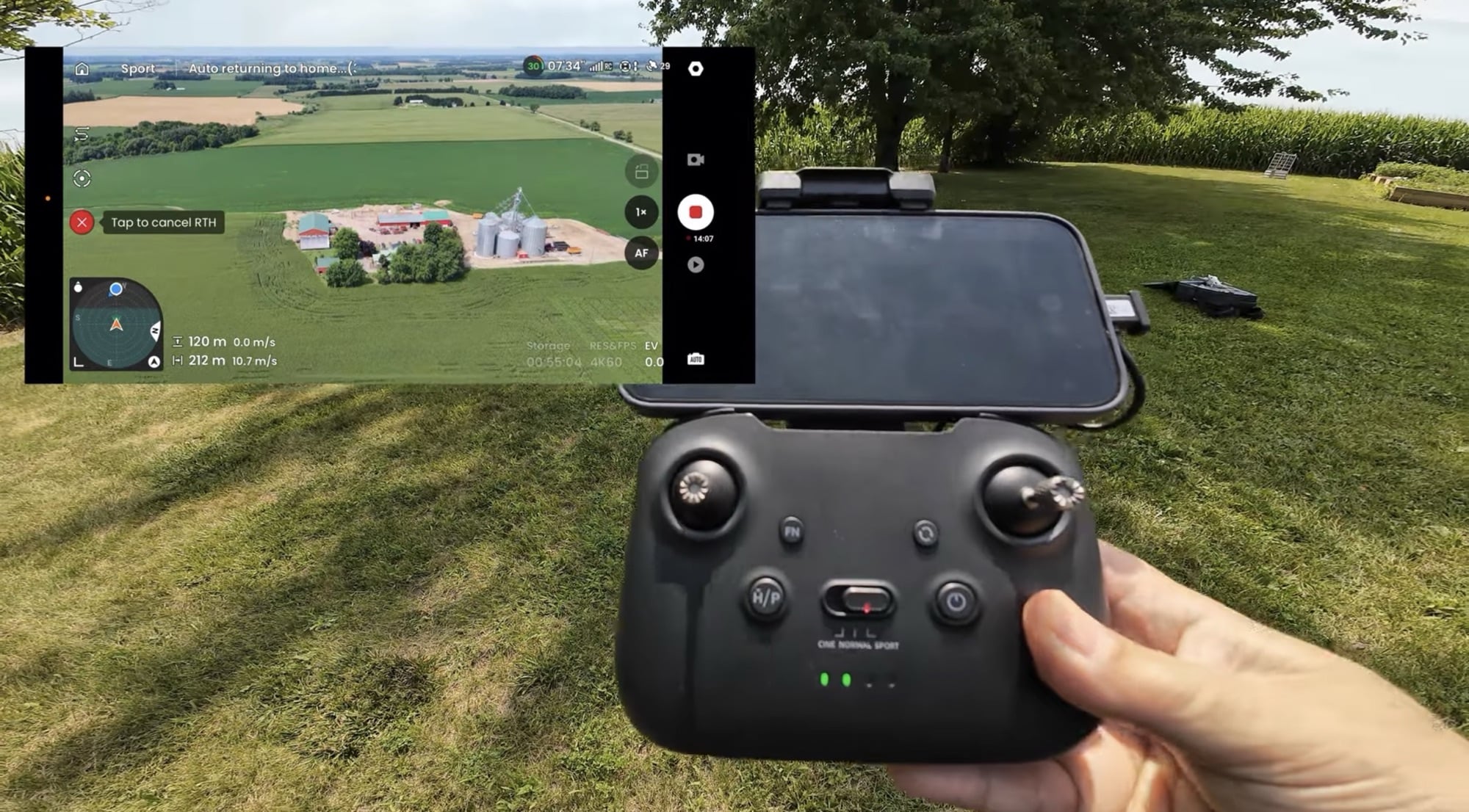 The Skyrover controller and phone show the live feed and map during the range run.