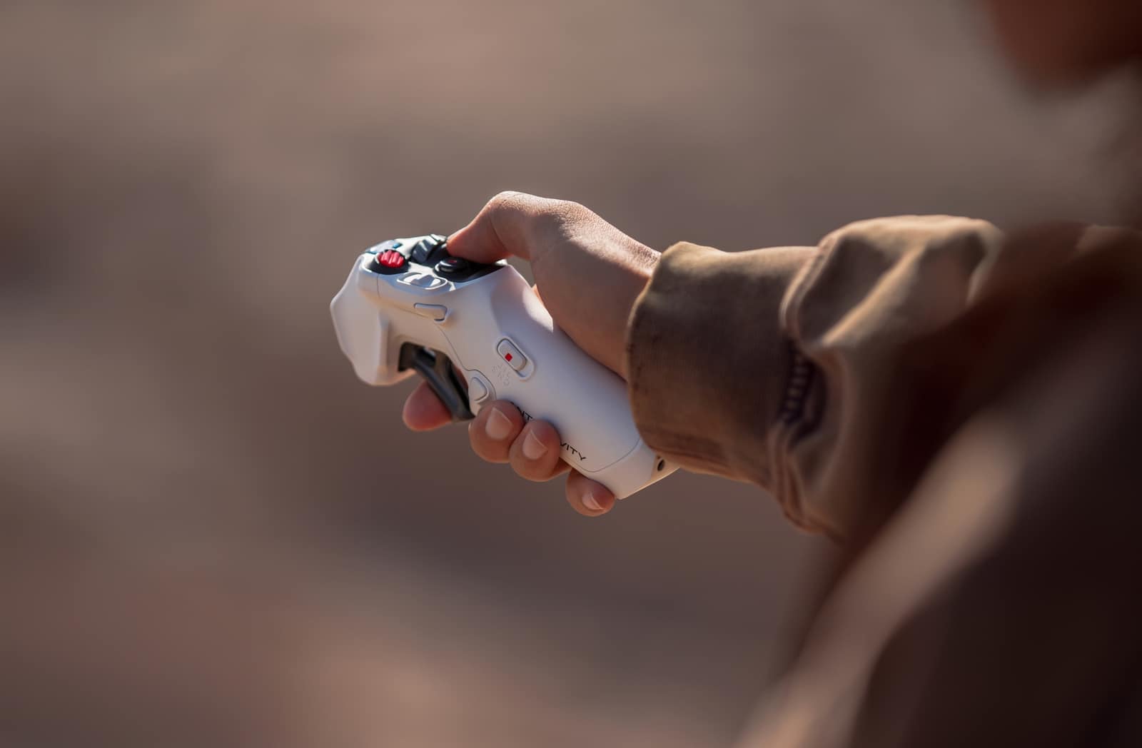 The Antigravity Vision goggles and Grip controller used to steer the A1 by hand gestures.