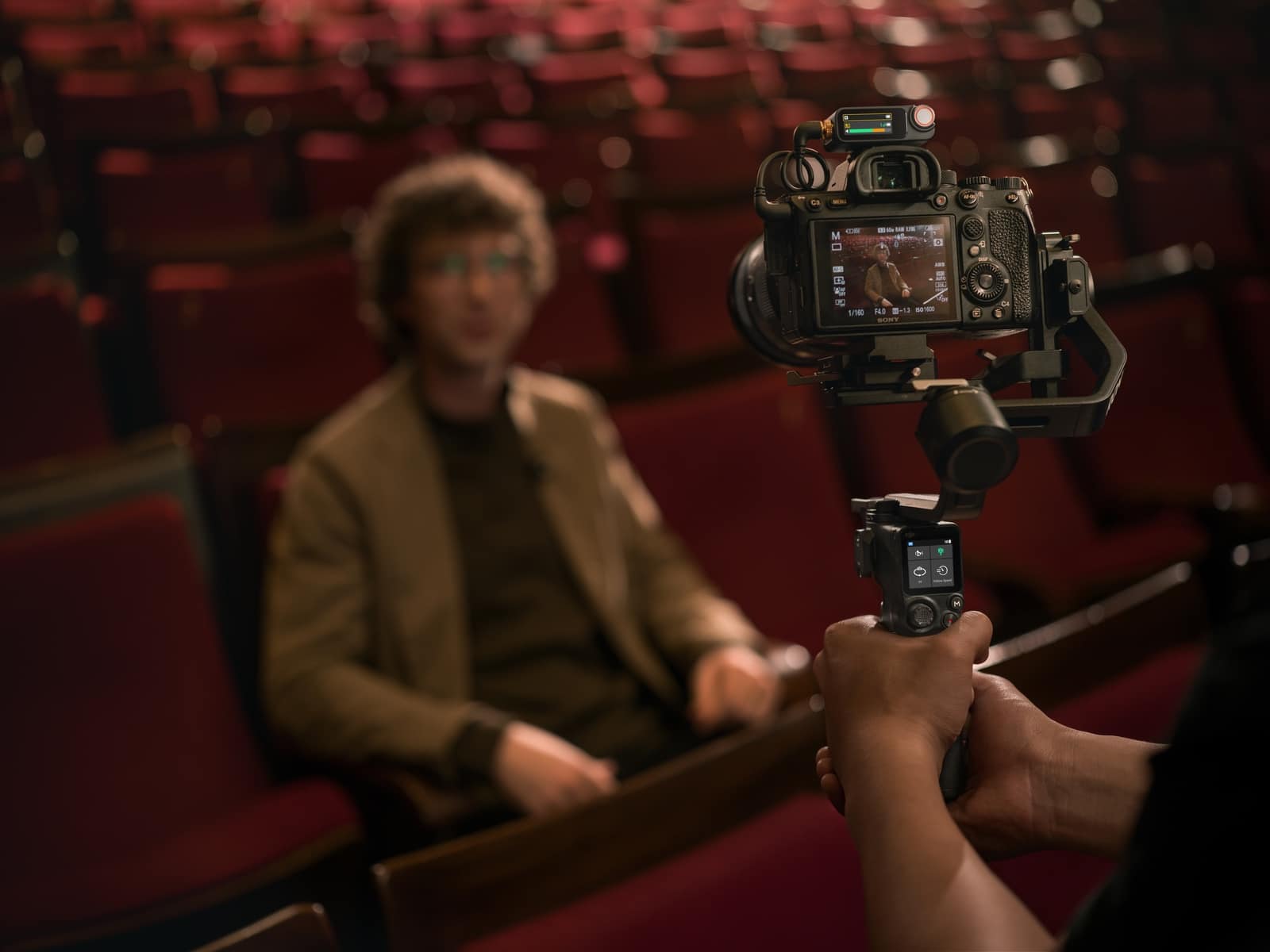 The Mic 3 transmitter and receiver on a camera mounted to the DJI RS 3 Mini gimbal.