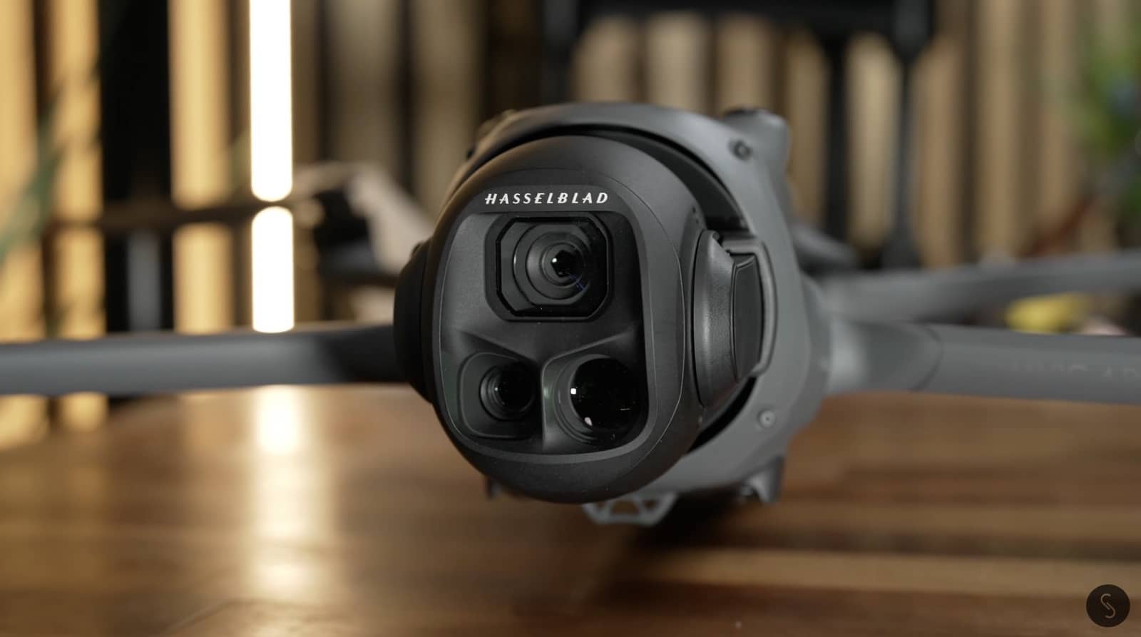 The wide-angle lens clipped over the Mavic 4 Pro gimbal, which blocks startup calibration.