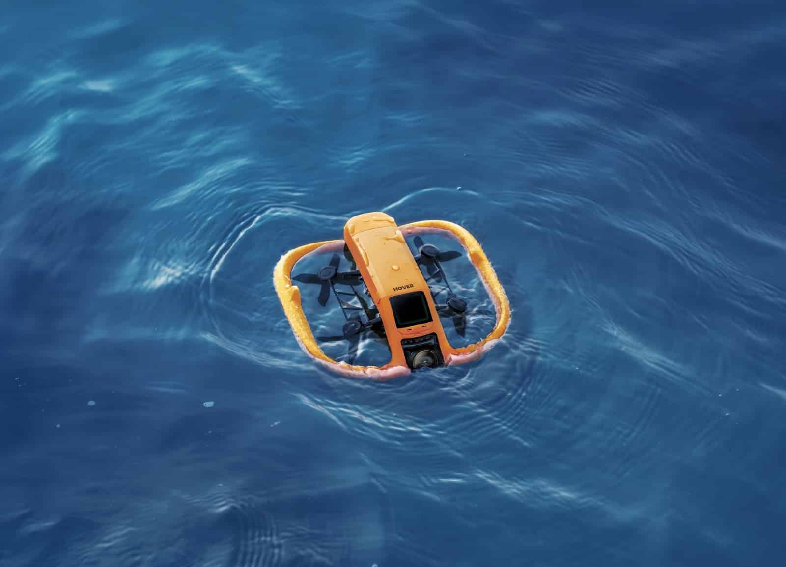 The HoverAir AQUA lifting away from the deck of a boat.