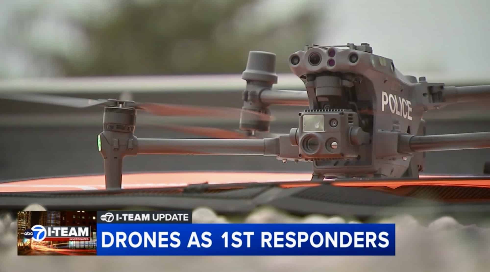 A police-marked quadcopter hovers in a news report on drone first responders.