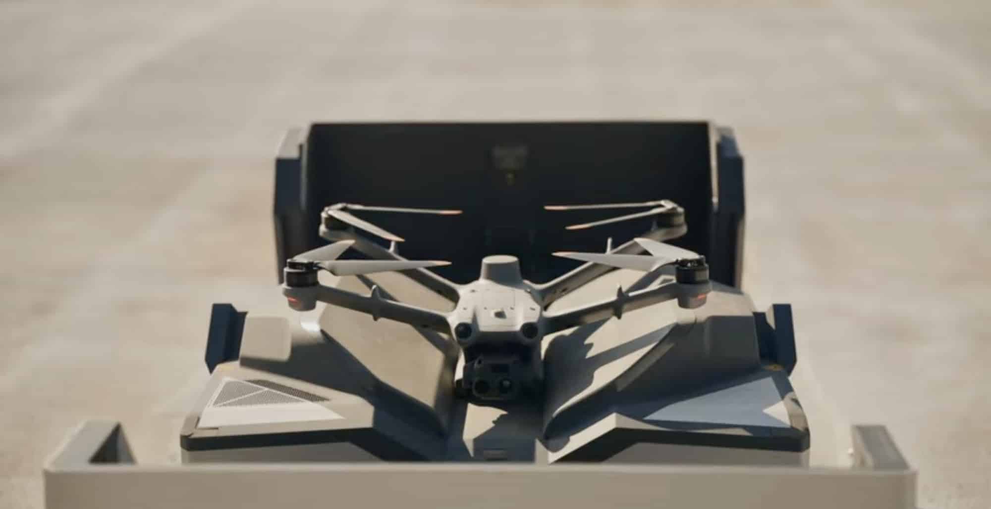 DJI Dock 3 open on a rooftop with its drone folded inside.