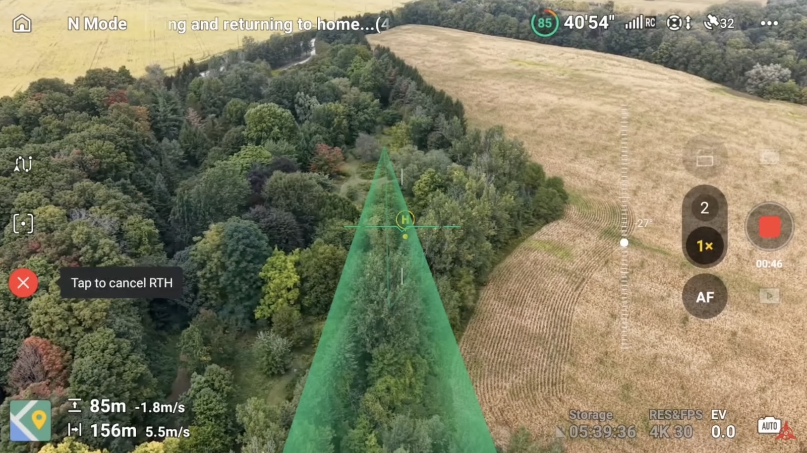 The controller screen showing the green return-to-home path bending left down the corridor.