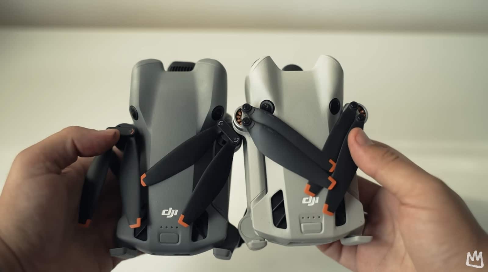 The Mini 5 Pro and Mini 4 Pro placed side by side for size comparison.