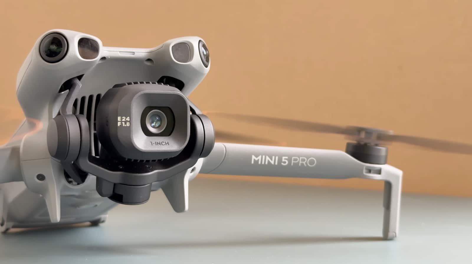 Close-up of the DJI Mini 5 Pro gimbal and its 1-inch camera sensor.