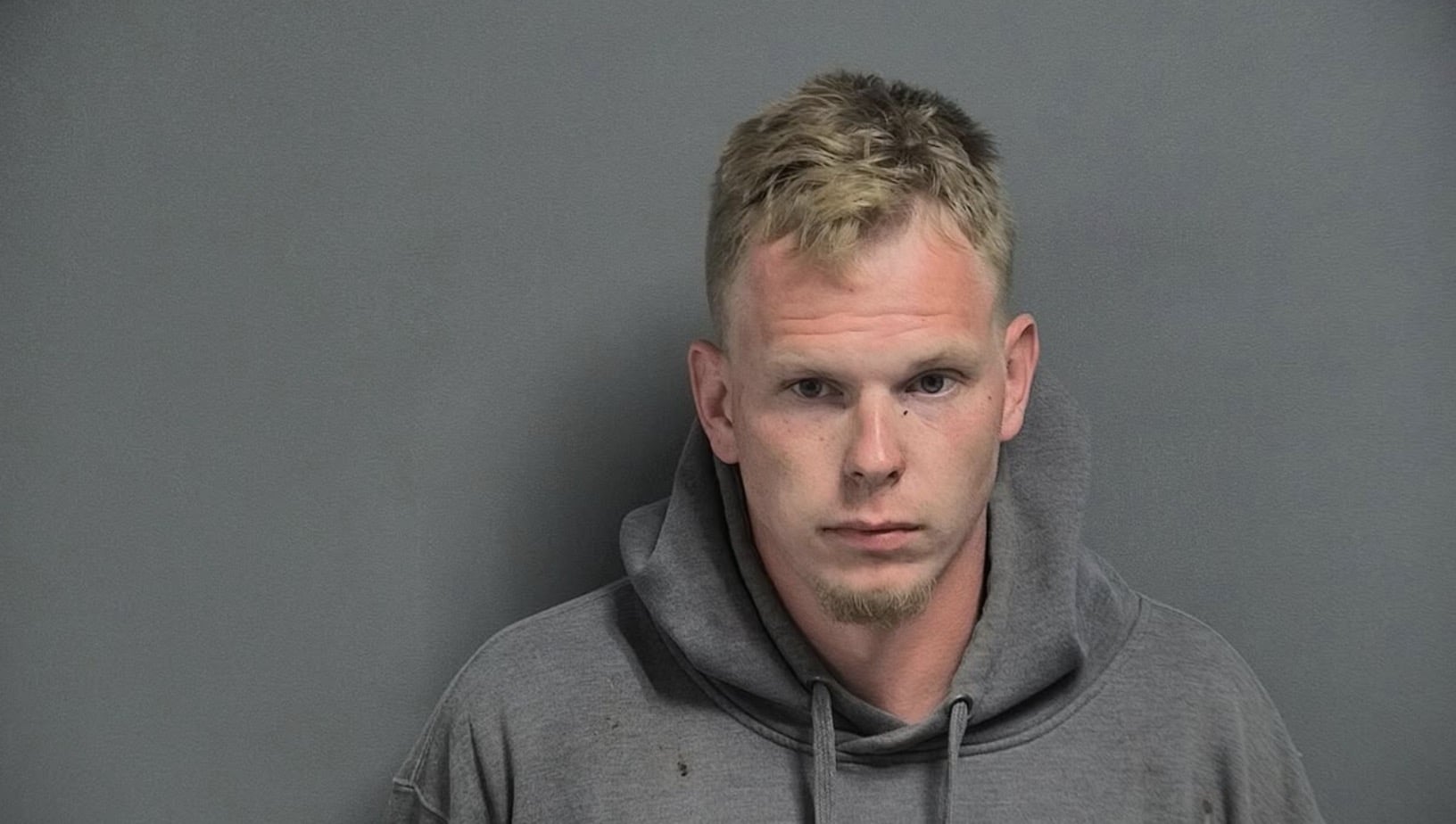 Booking photograph of the man arrested after fleeing an Indiana crash scene.