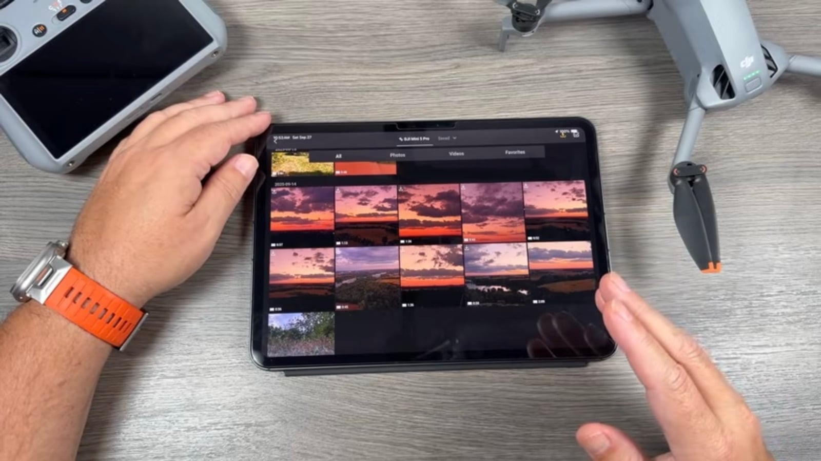 Camera roll grid on the iPad filled with transferred sunset stills.