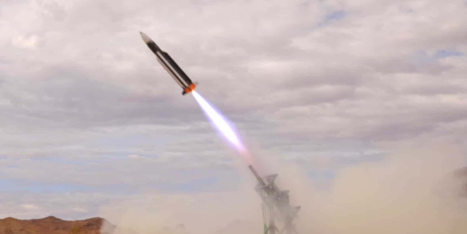 Counter-drone missile climbing away from its launcher trailing a bright plume.