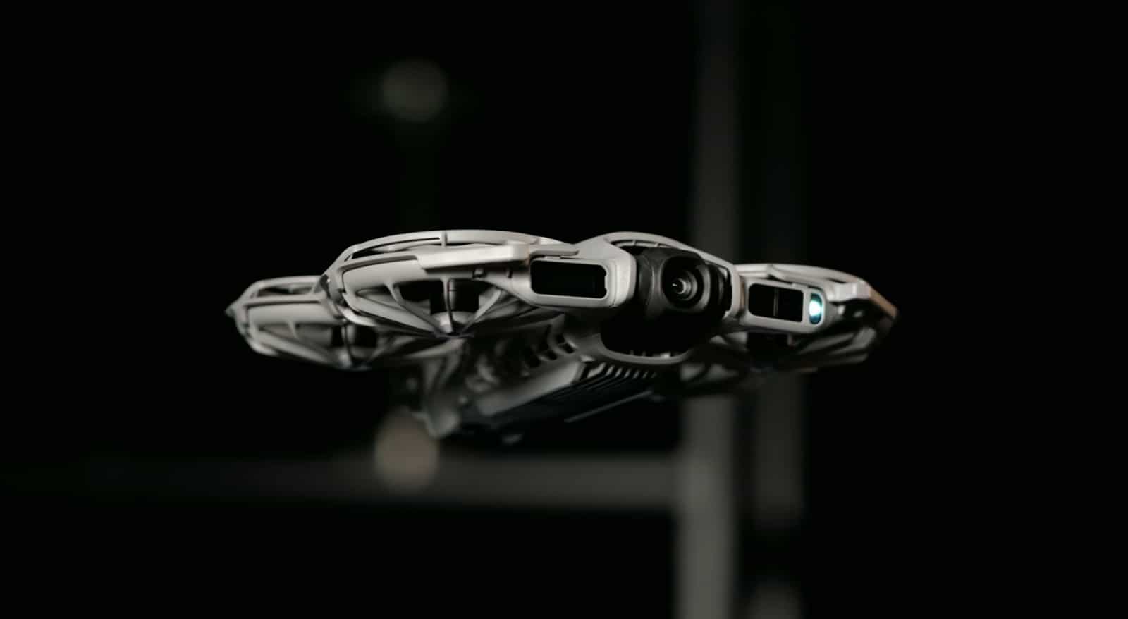 Side profile of the grey NEO 2 against a dark studio backdrop.