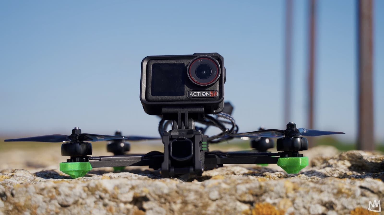 A DJI Action 5 Pro mounted on the front of an FPV freestyle quad.
