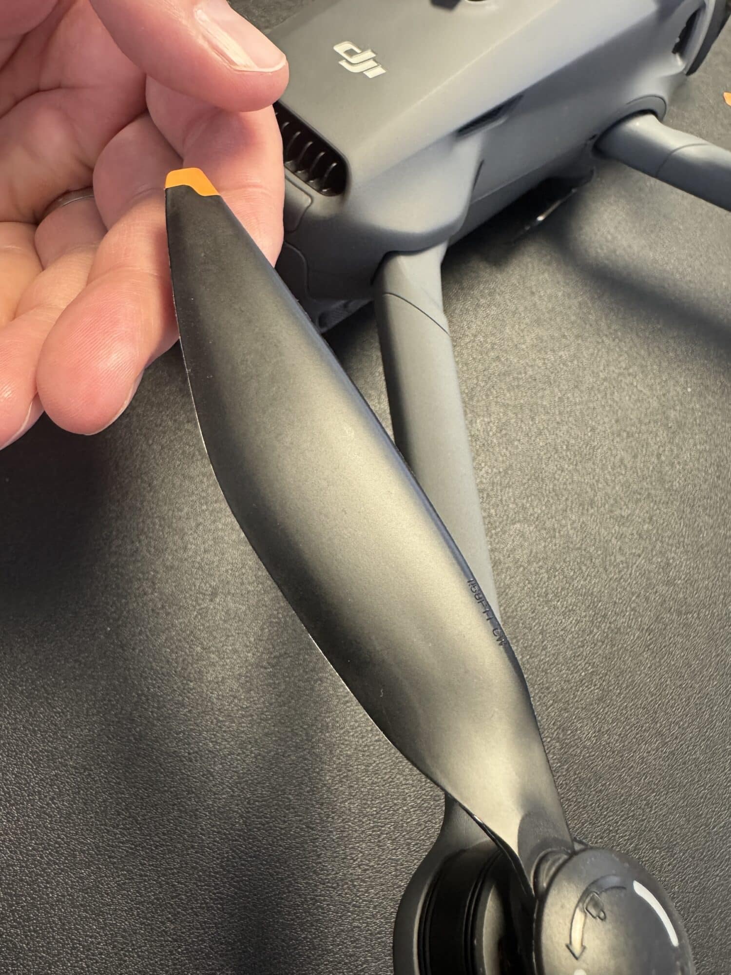 Damaged propeller and motor from the Mavic 4 Pro after its fall from roughly 10 feet.