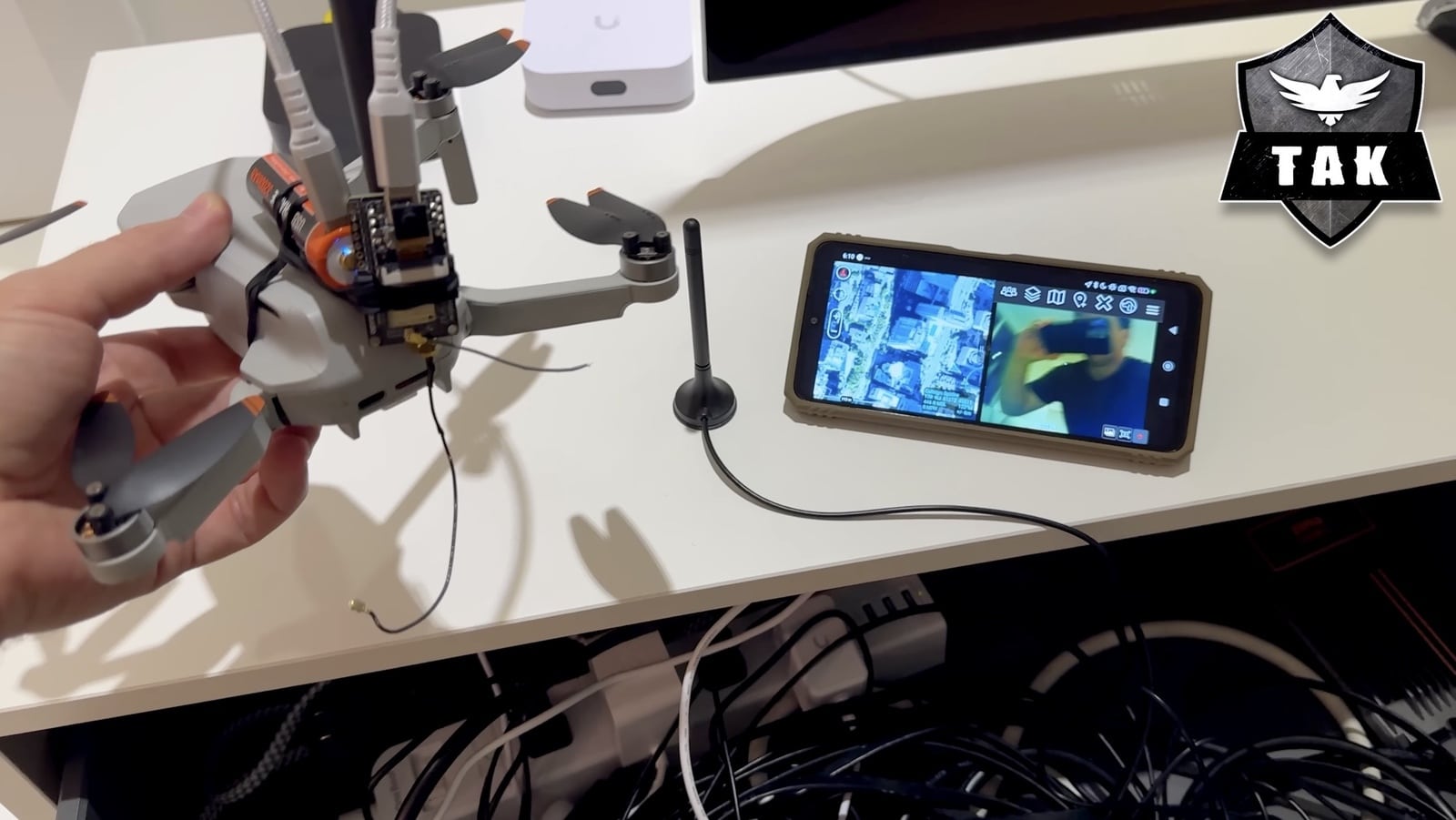 The Scout payload strapped to Data Slayer's battle-worn DJI Mini SE.