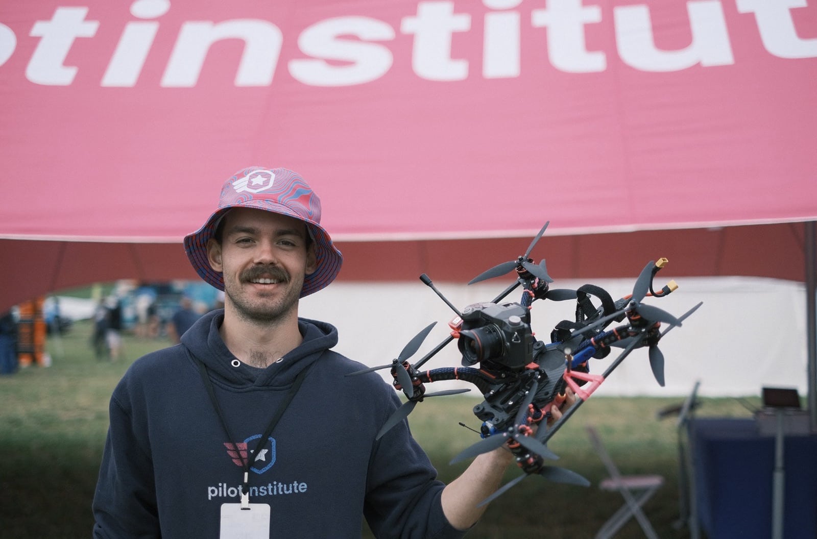 Camping setups pitched behind the flight line at the multi-day Flite Fest 2023.