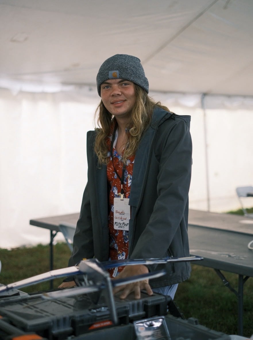 Attendees browsing vendor tables at Flite Fest 2023.