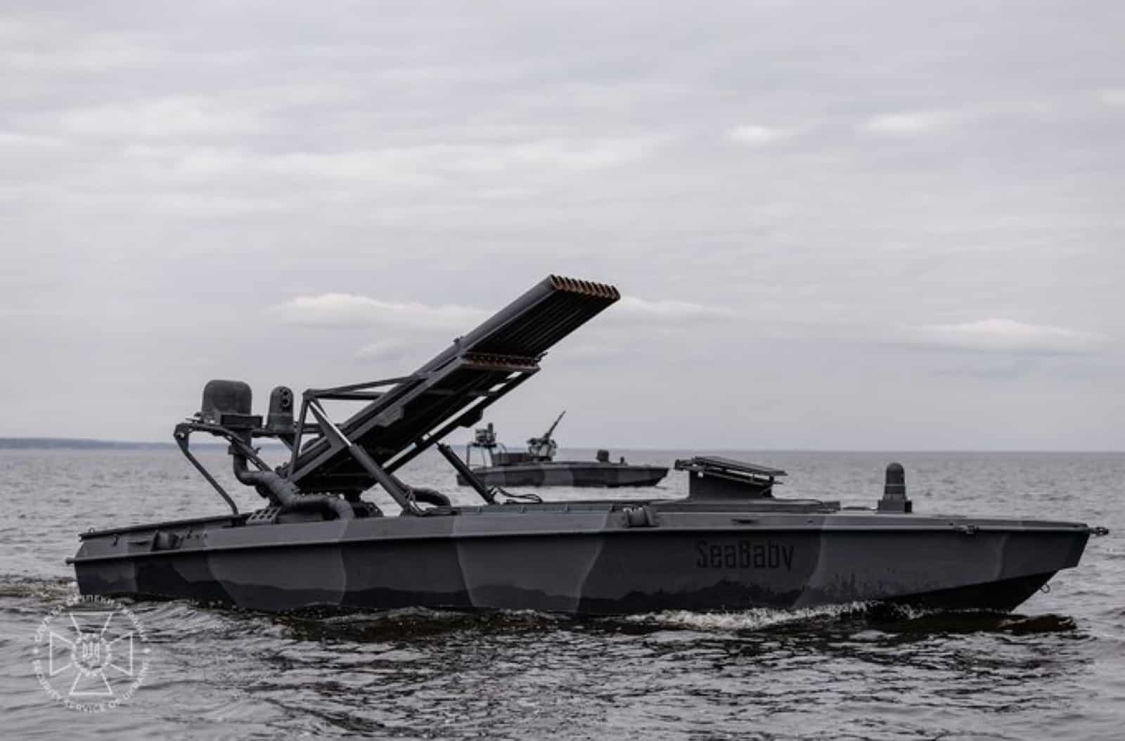 Sea Baby naval drone carrying a rocket launcher rack under way at sea.