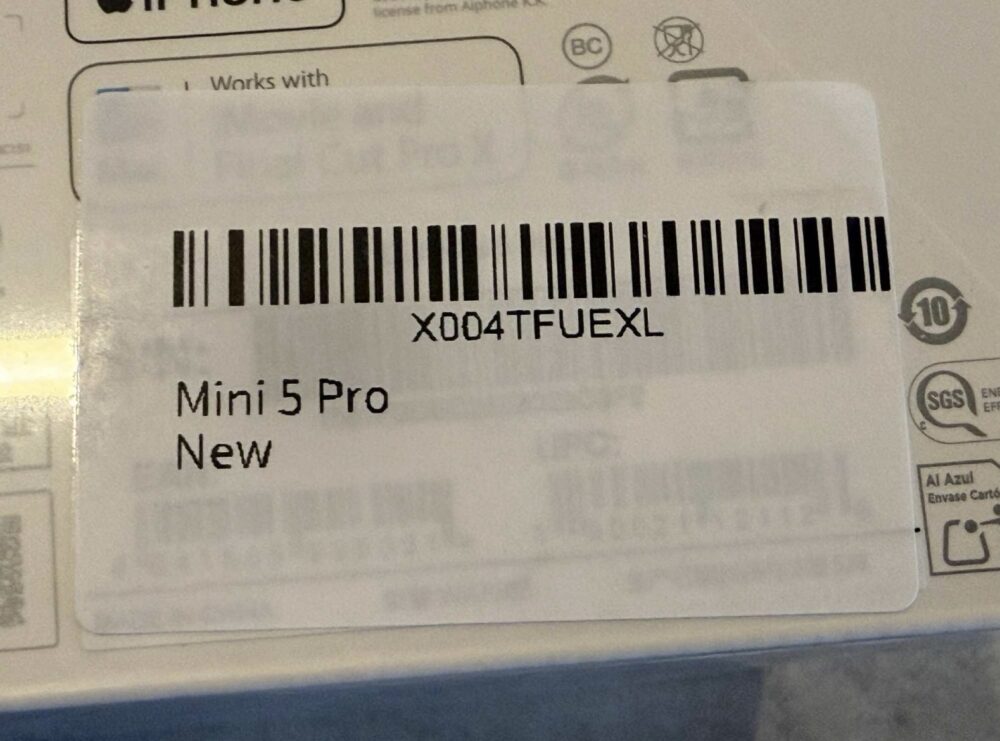 Amazon shipping label reading Mini 5 Pro New above a printed barcode.