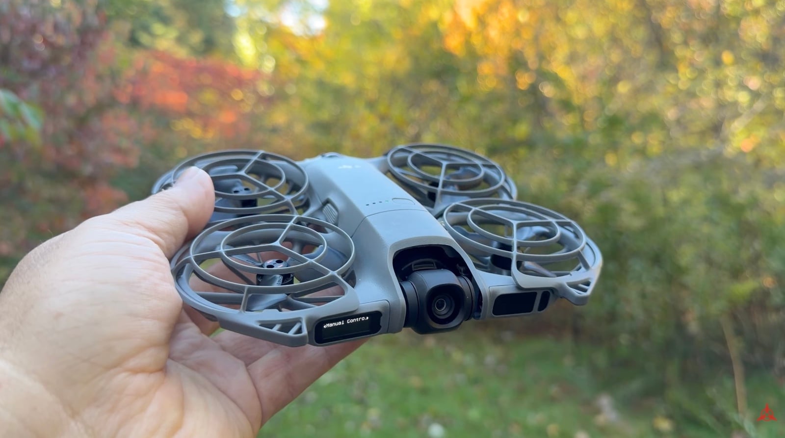 The DJI Neo 2 with its detachable O4 digital transceiver connected by USB-C.
