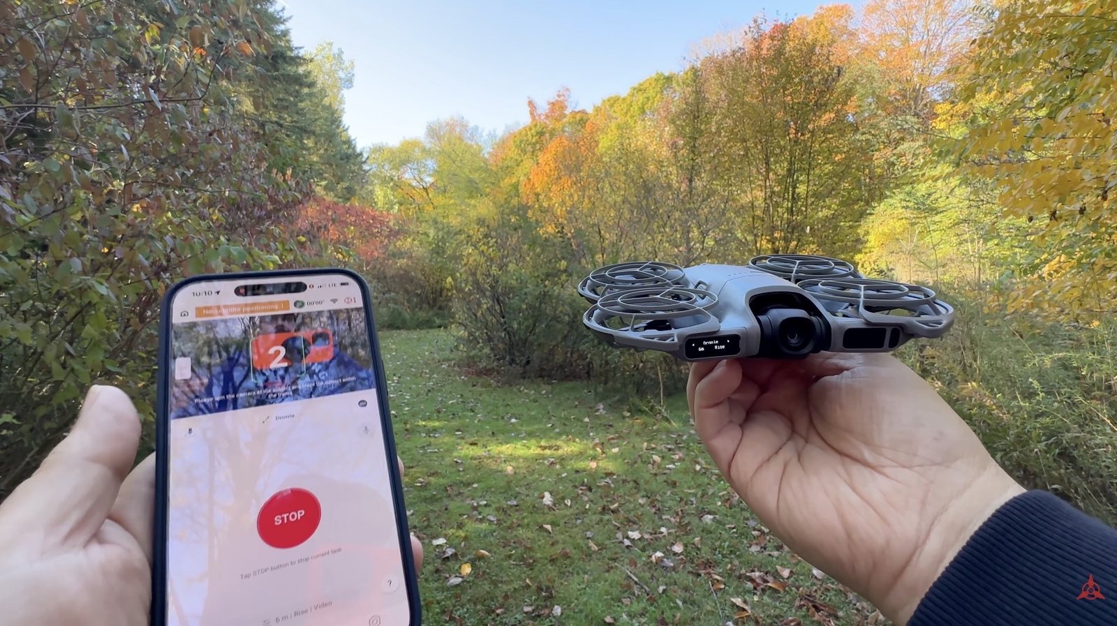 The DJI Fly app flying the Neo 2 with virtual joysticks on a smartphone.