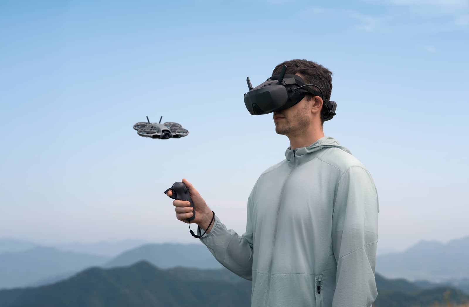 DJI Neo 2 paired with the RC-N3 remote controller and a smartphone.