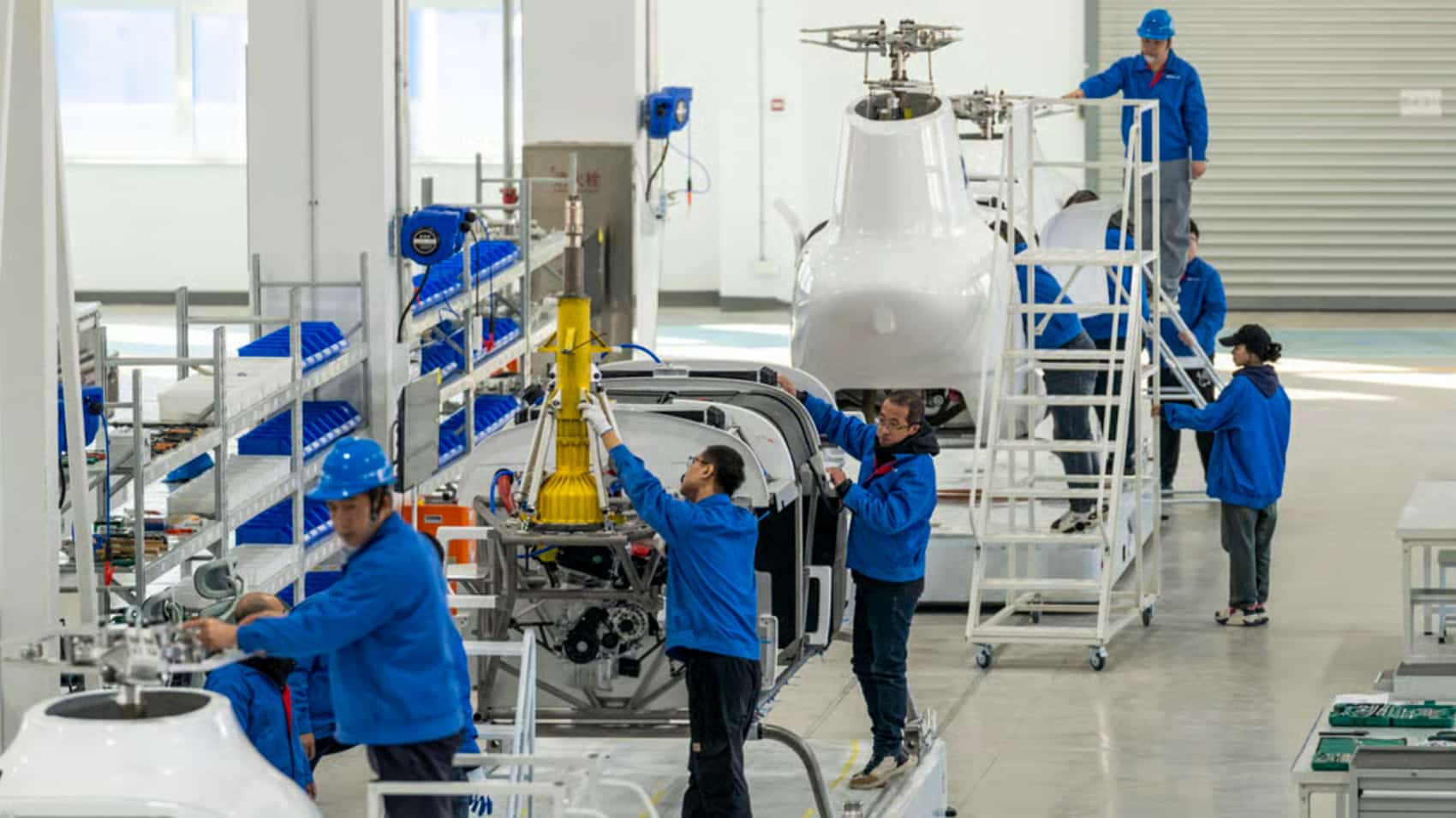 United Aircraft Technology crew working on the Boying T1400 before flight.