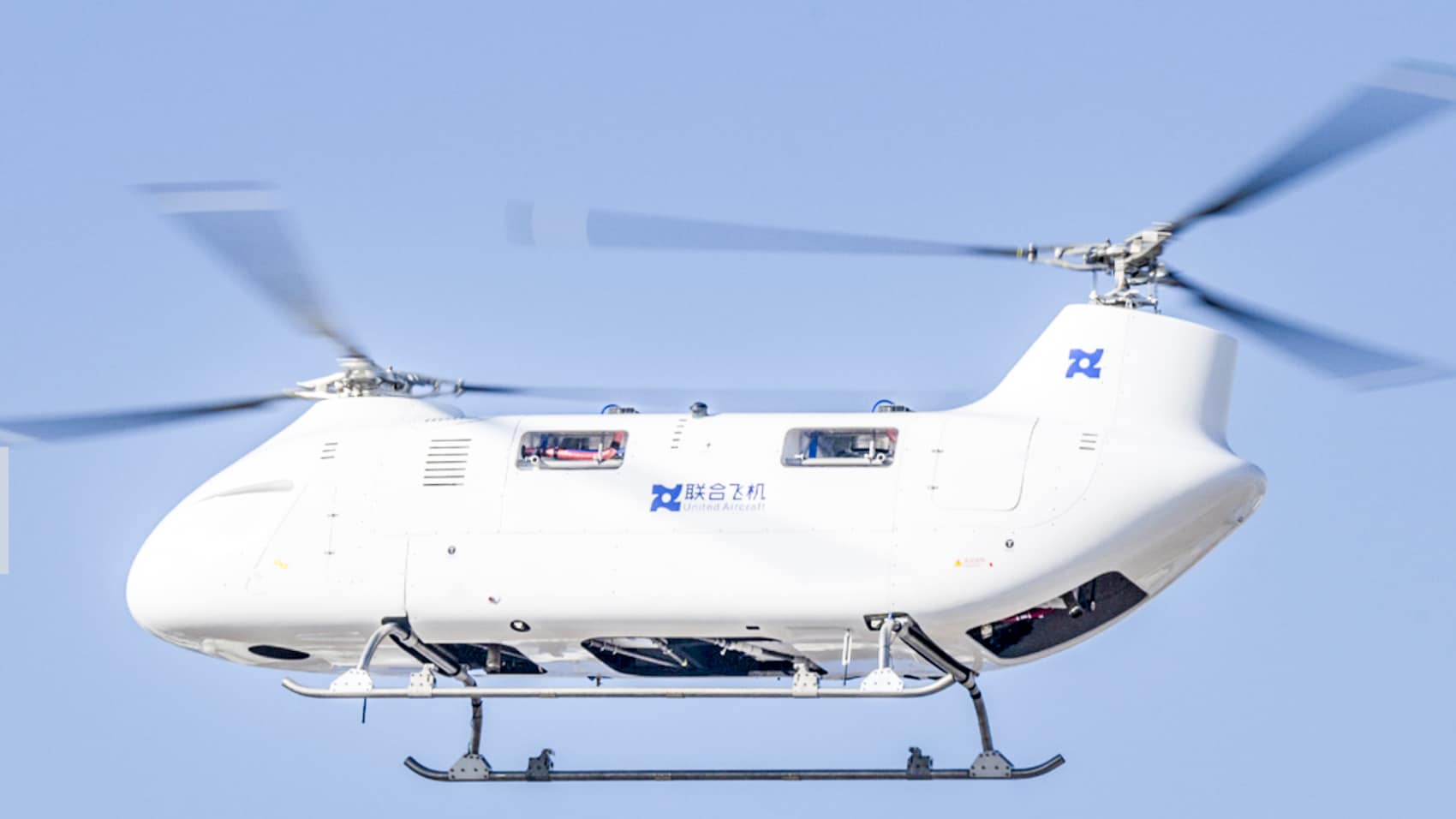 The Boying T1400 unmanned tandem rotor helicopter during its first flight in Harbin.