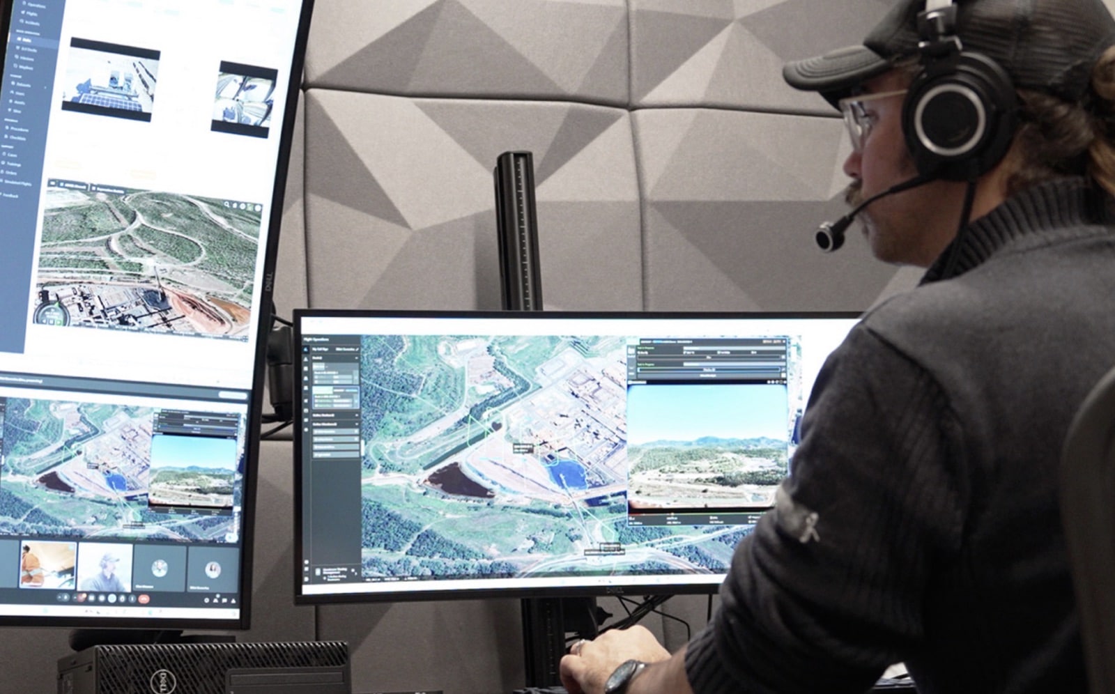 Sphere chief remote pilot Elliot Cummins operating a BVLOS mission from a multi-screen console.