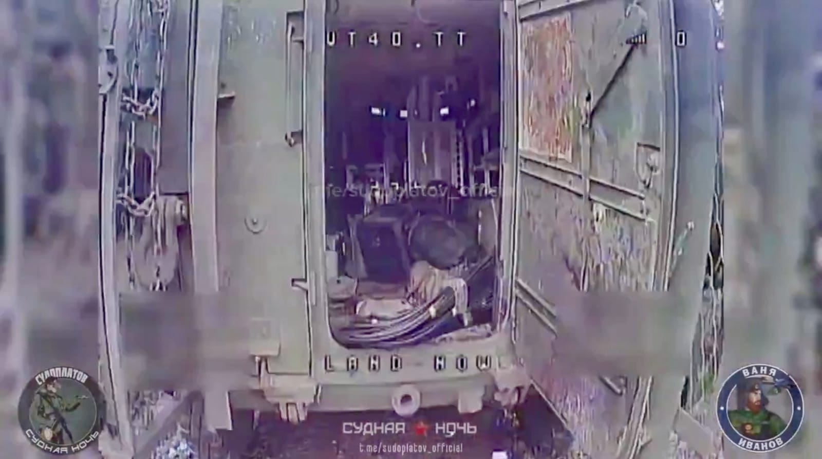 Grainy Russian FPV strike feed labeled VT40 with military unit insignia overlaid.