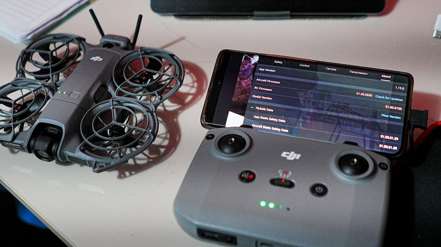 The DJI RC-N3 controller showing the firmware version that must change with each drone.