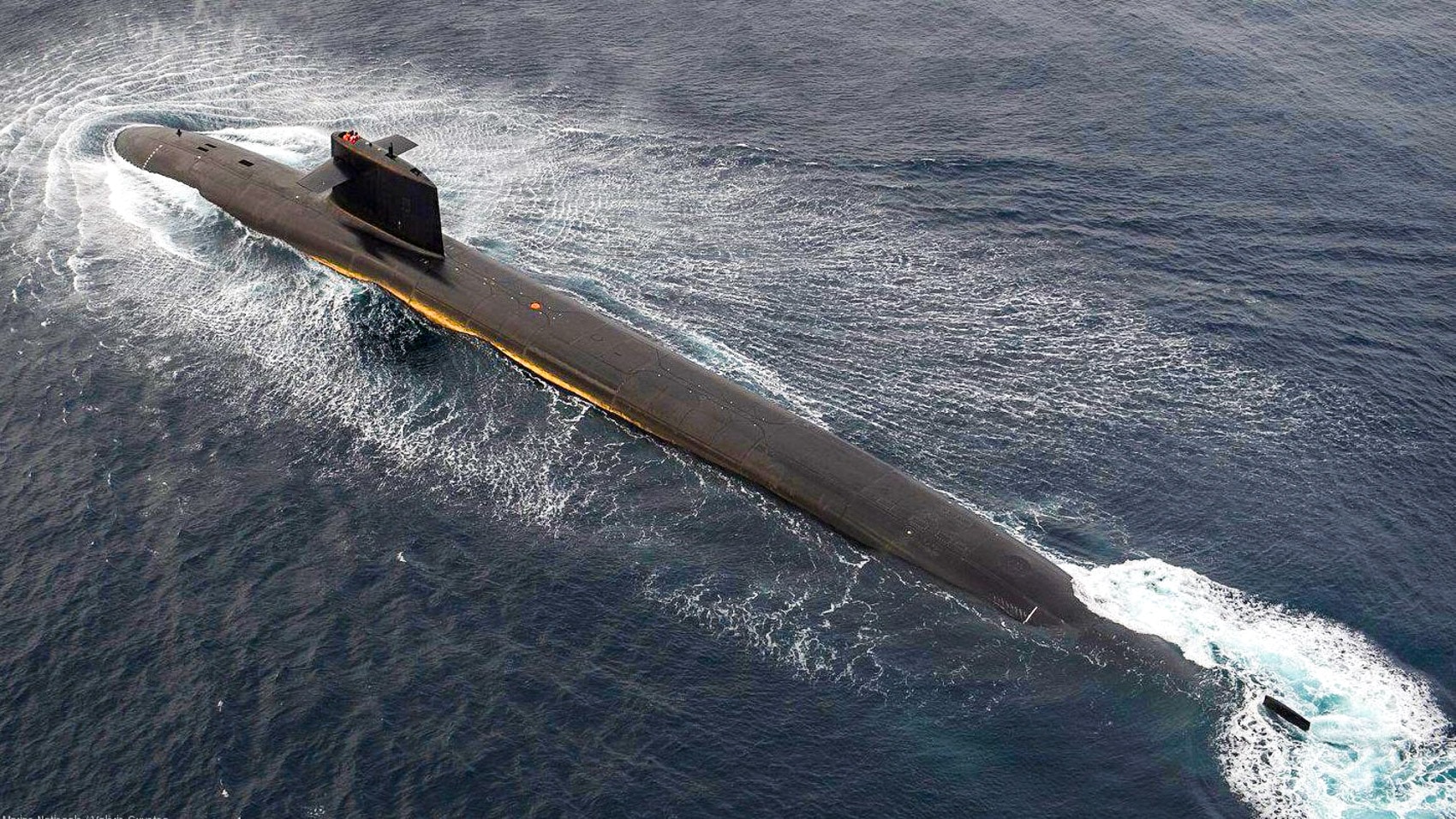 Bow view of a French nuclear ballistic missile submarine of the same class.